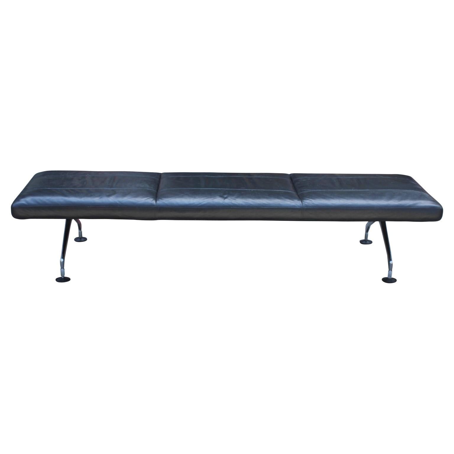 Modern black leather area bench designed by Antonio Citterio for Vitra in the 1990s. It has chrome legs with black padding on each ends. The benches can be sold as a pair or individually, (price is for individual bench).