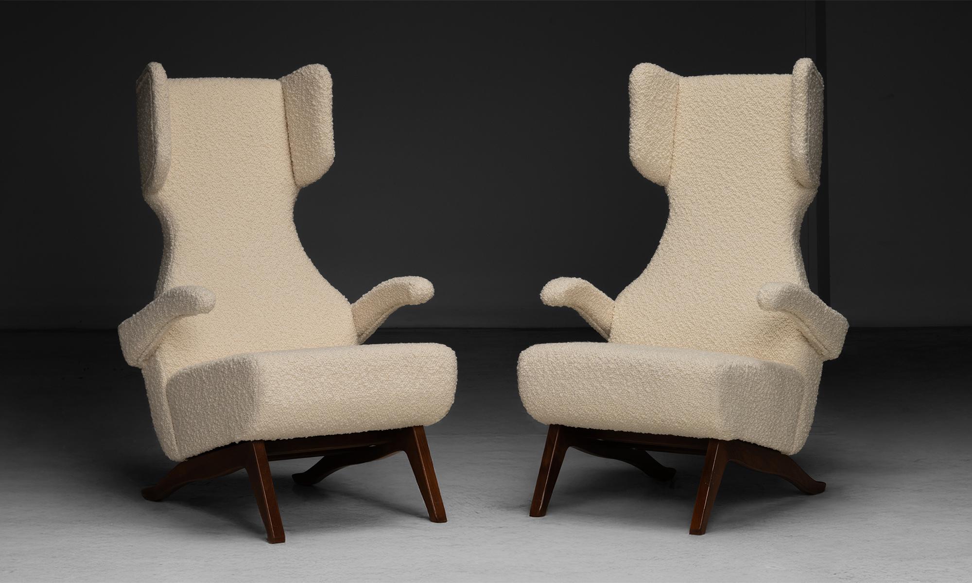 Modern Armchairs in Boucle
Italy, 1960
High back symmetrical modern wingbacks, newly upholstered in boucle.
28”w x 30”d x 47”h x 17”seat