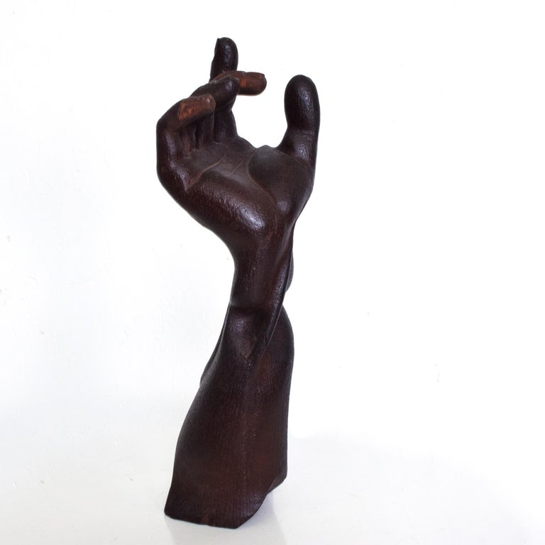 Realistic Brutalism Mexican Modernism 1950s: Wood hand sculpture hand carved dark wood in rich patina. 
In the manner of Mathias Goeritz artist.
Unsigned. No markings present from the maker or designer.
Dimensions: 16 H x 5 W x 5 D.
Original