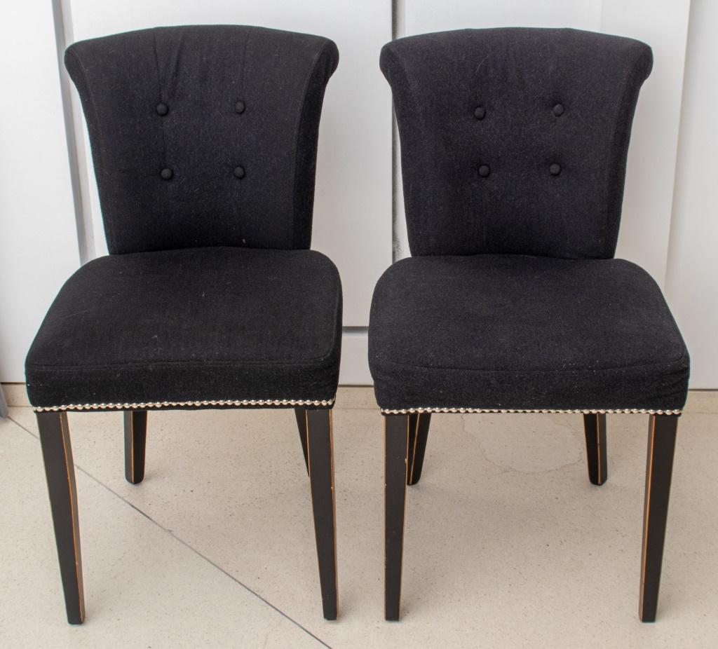 Modern Art Deco revival boudoir chairs, with scrolling backs centered with a chromed ring, on shaled square seat above ebonized tapering square legs, and rear splayed legs, upholstered in black wool with chromed nail head details. 34