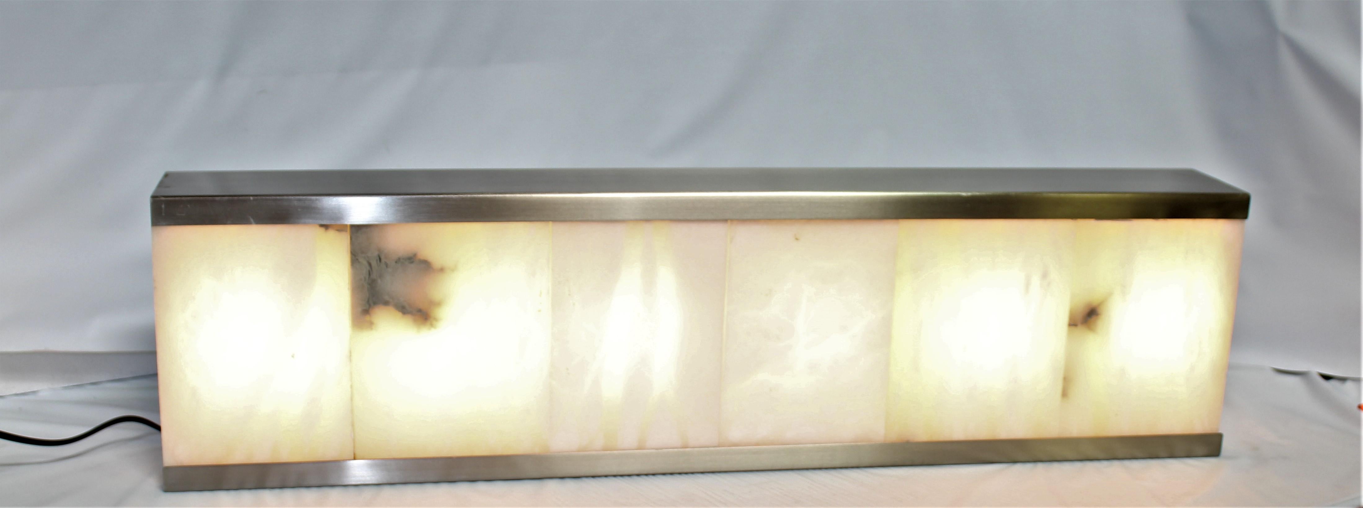 Large size rectangle sconce. Blocks of alabaster cut to fit the metal frame. All satin nickel finished. Over 30 1/2