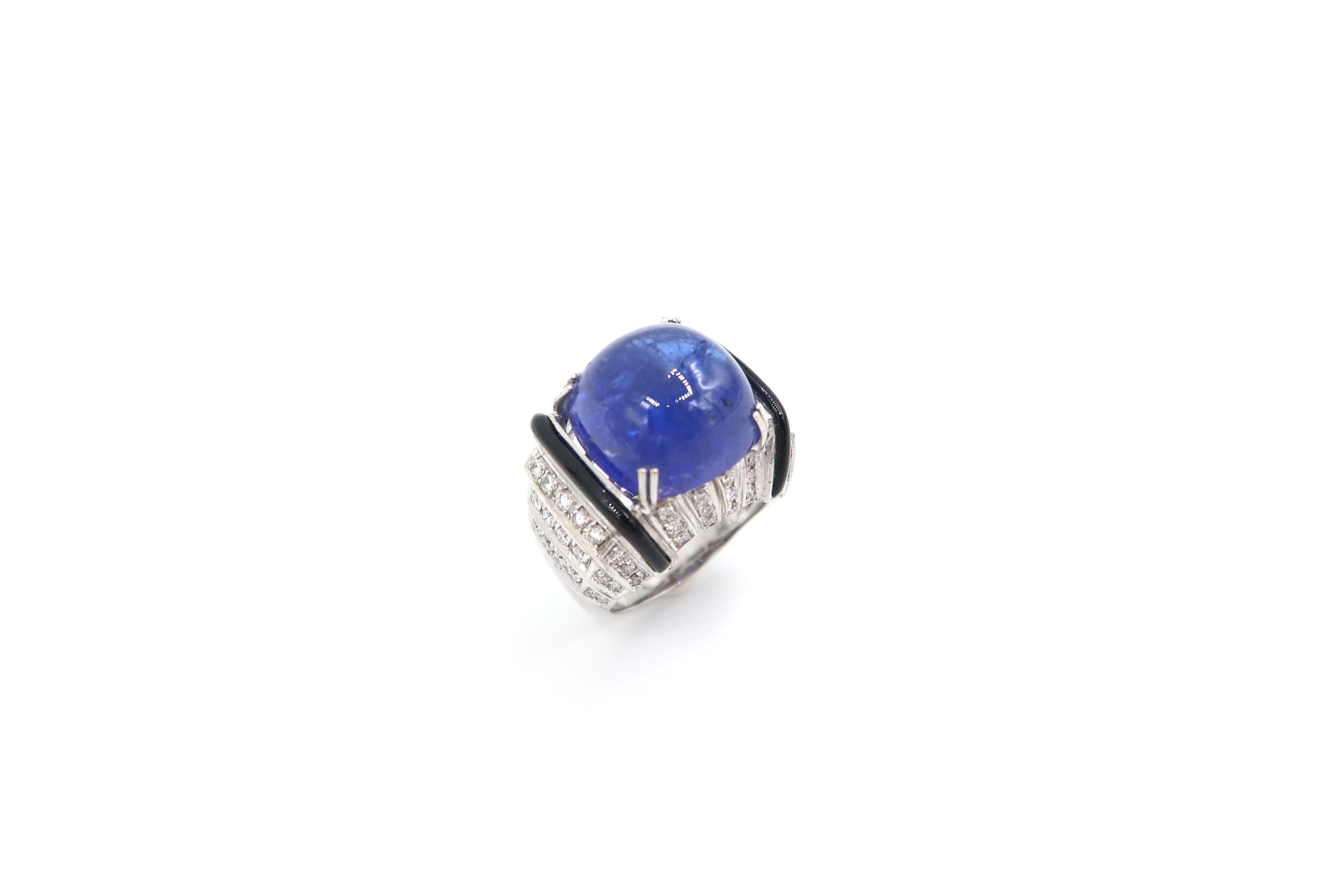 Art Deco Inspired 18.85 Carat Cabochon Tanzanite Ring embellished with Onyx and Diamond in 18K White Gold Setting

Should you wish to have the ring resized, please kindly let us know upon checkout.

Size : US7, N

Tanzanite : Cabochon 18.85cts.
Gold