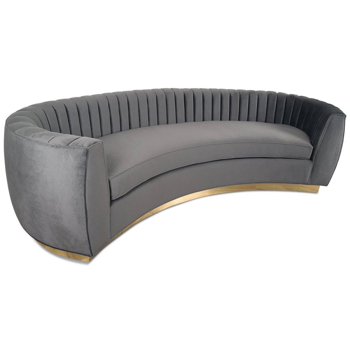 Our all-new St. Germain 9 foot sofa is similar in style to our Art Deco sofa featuring classic clean lines, sharp curves, crescent-like shape, curved in arms, and all-around Gold colored toe kick. With the long arm tufting on the backrest, this is a
