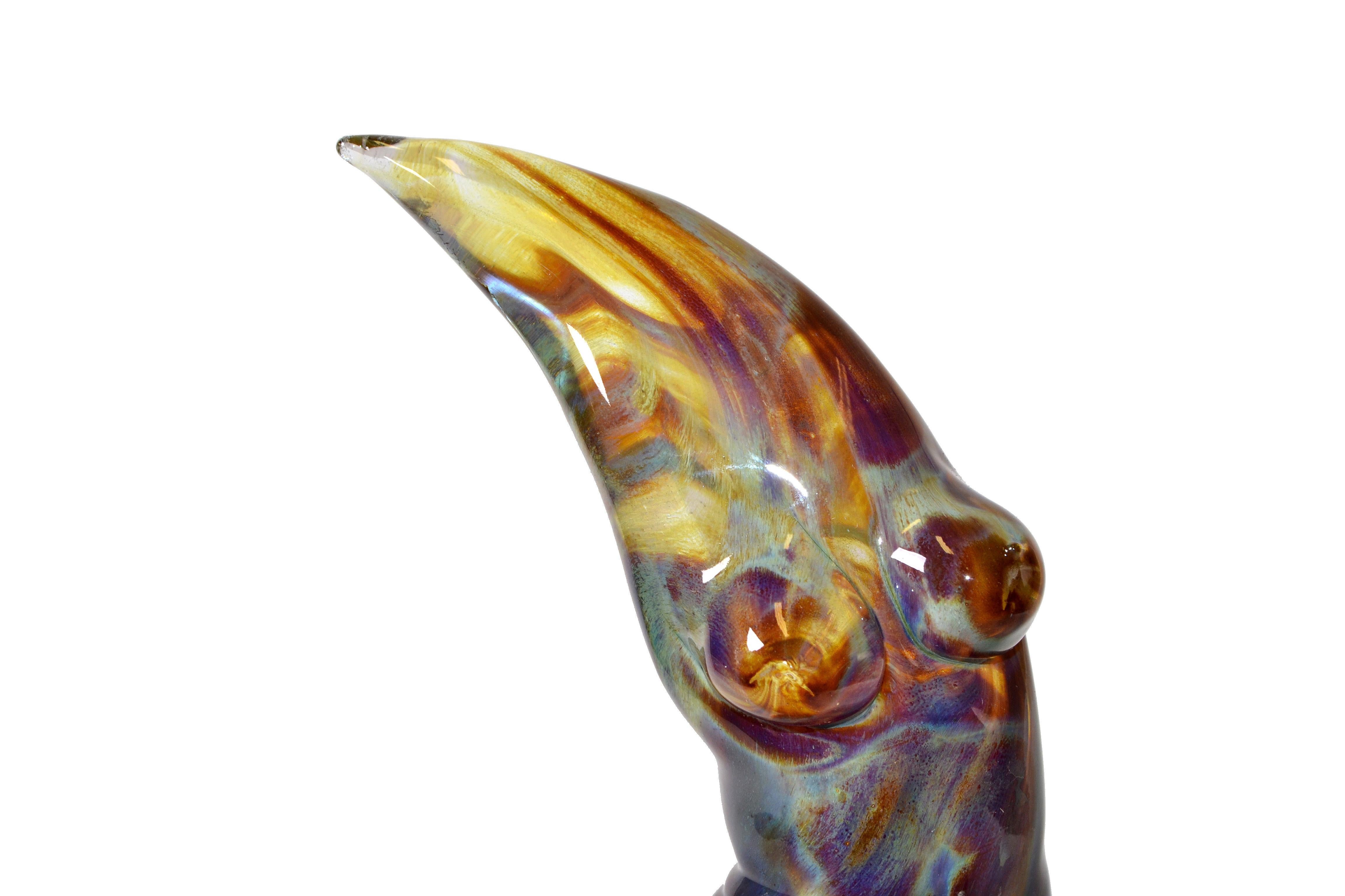 Studio piece blown brown and gold art glass sculpture of a dancing nude woman.
Titled: The Way She Moves.
Copyright and signed by unknown artist, dated.
  