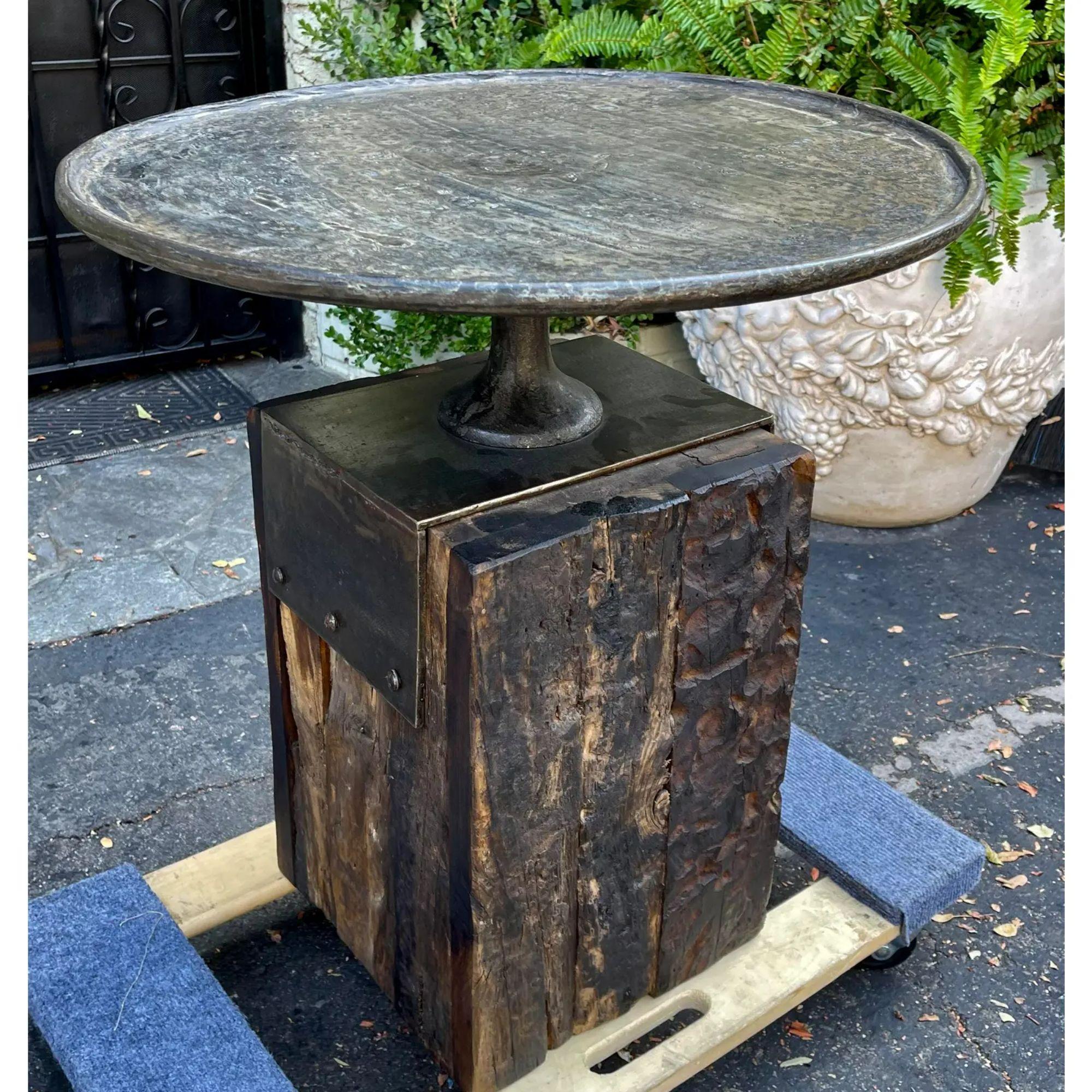 Modern arteriors industrial chic pounded iron & railroad tie table

Additional information:
Materials: iron, wood
Color: gray
Brand: Arteriors Home
Period: 2000 - 2009
Styles: Industrial, Modern
Table Shape: Round
Item Type: Vintage,