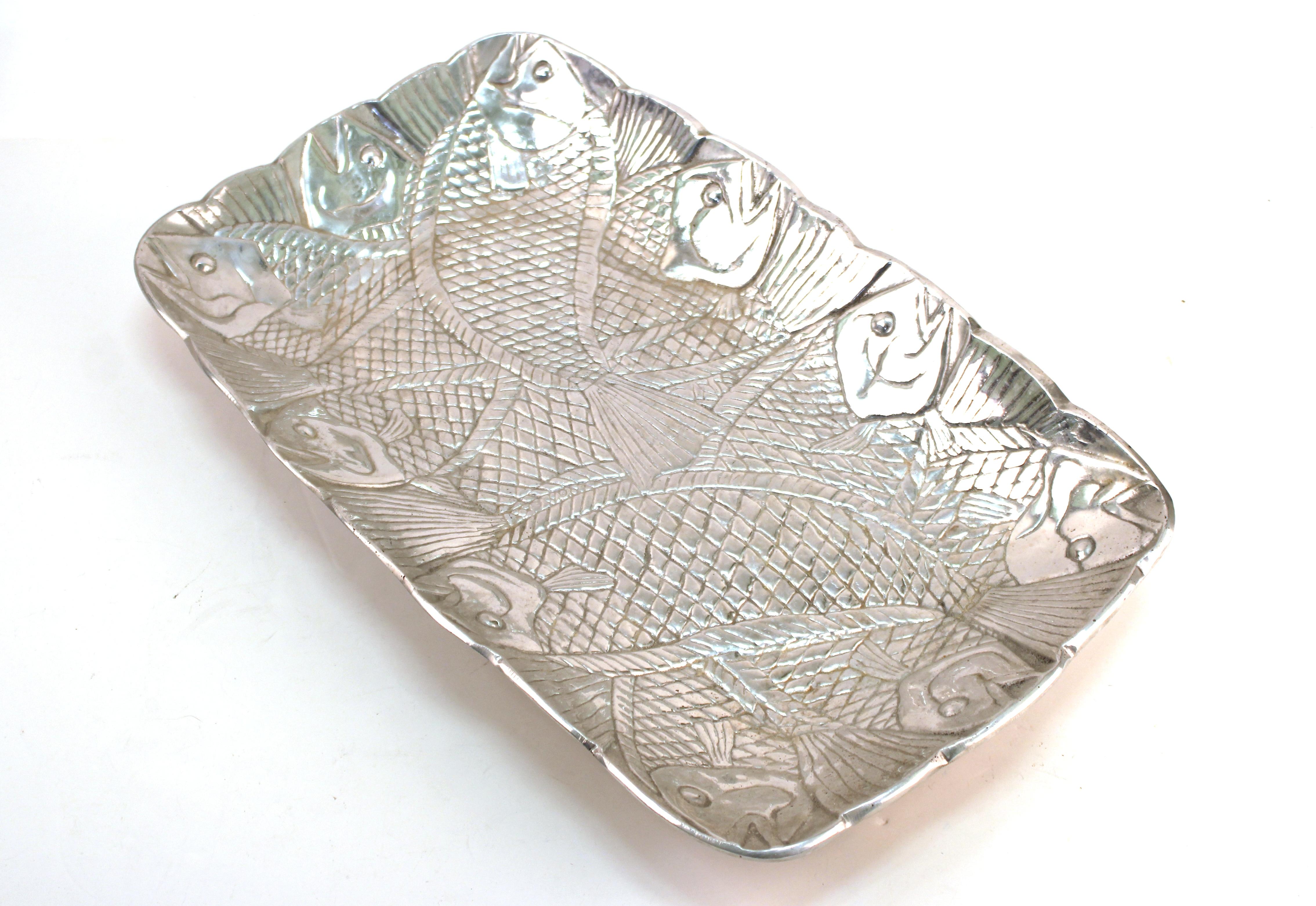 Modern aluminum serving tray or decorative dish designed in the style of Arthur Court. The piece has an all-over fish theme and is unmarked. In great vintage condition with age-appropriate wear and use.