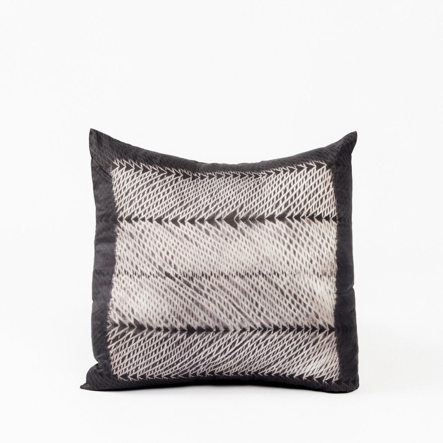 Custom design by Studio Variously, Ara Black Pillow is handmade by master artisans in India. A sustainable design brand based out of Michigan, Studio Variously exclusively collaborates with artisan communities to restore and revive ancient