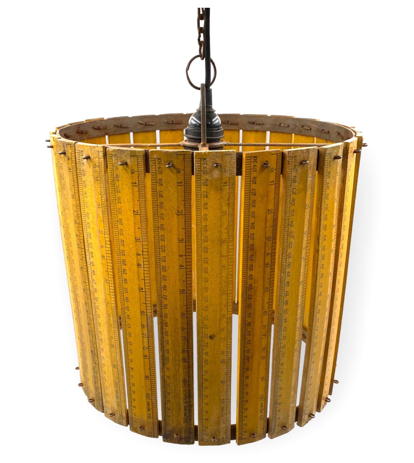 Iron Modern artisanal rulers shaped ceiling lamp, France 1960s For Sale