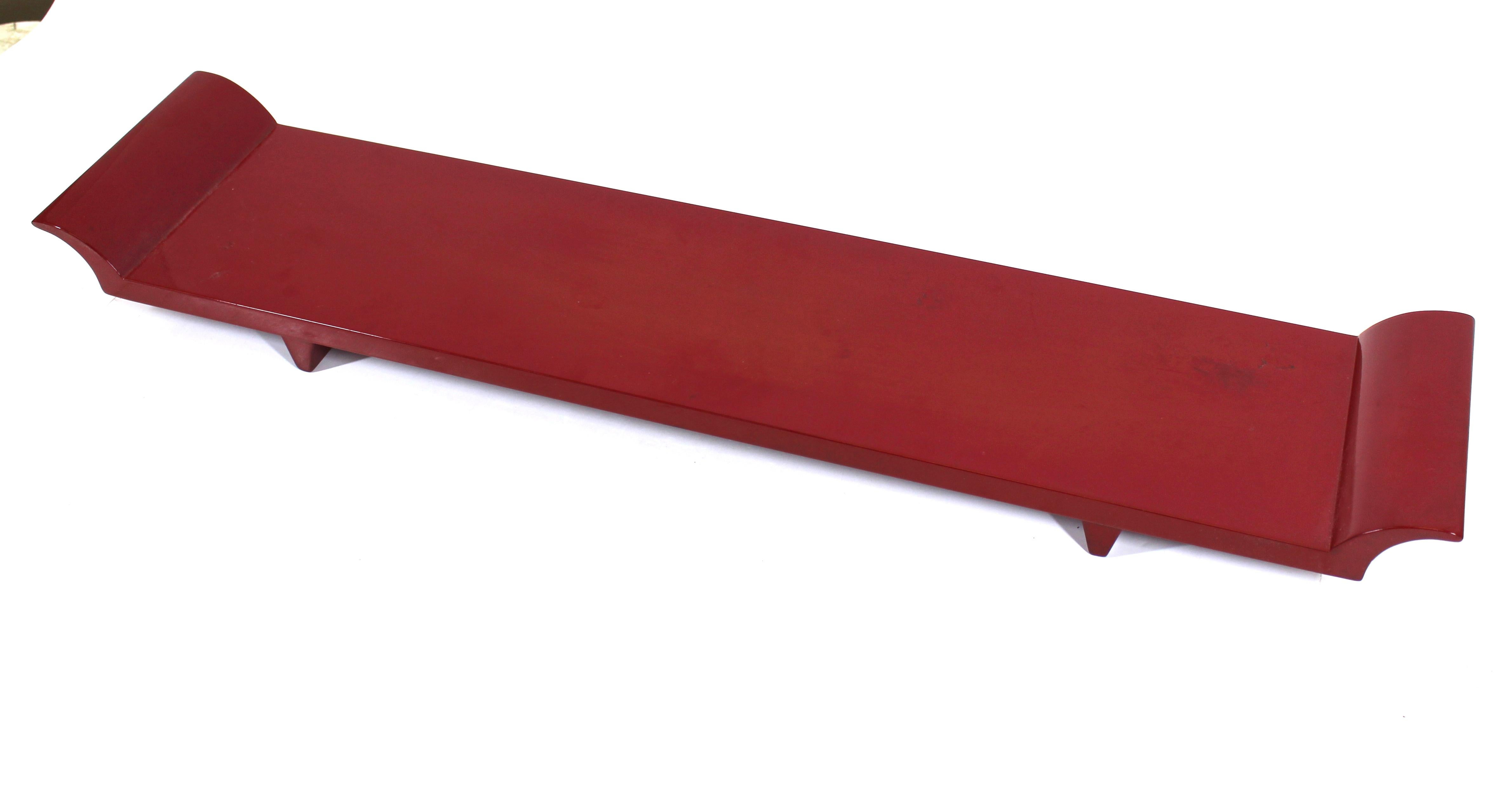 Modern Asian style red lacquered display board or pedestal, marked on bottom.