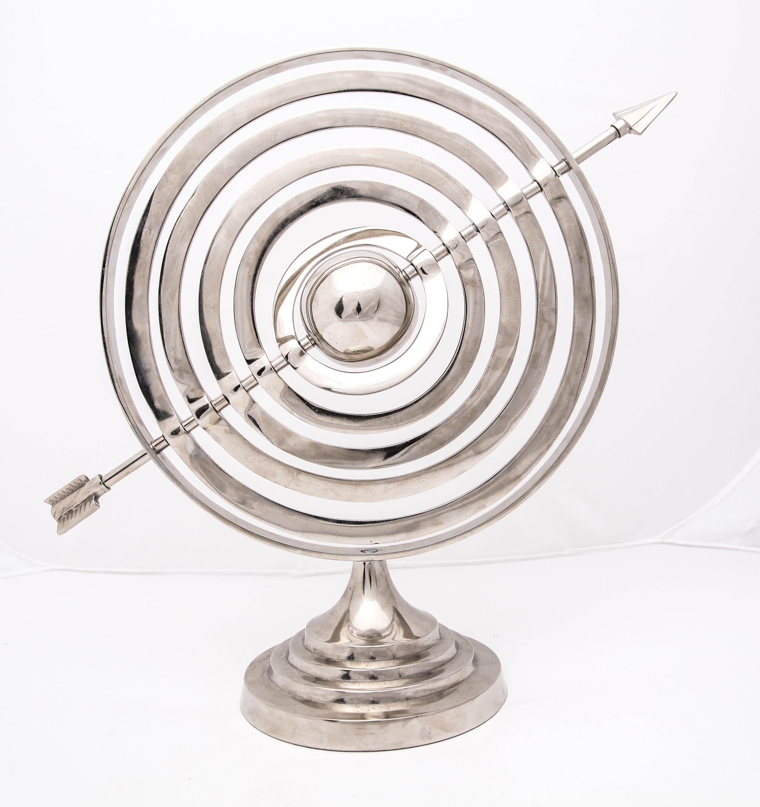 Modern astrolabe armillary sphere in polished aluminum, made in the 20th century. The piece is in great condition with very minor wear and patina to the surfaces.
