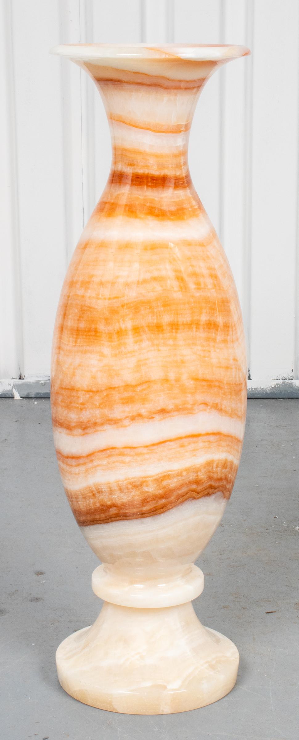 Pair of modern banded onyx specimen modern floor vases. Measures: 28