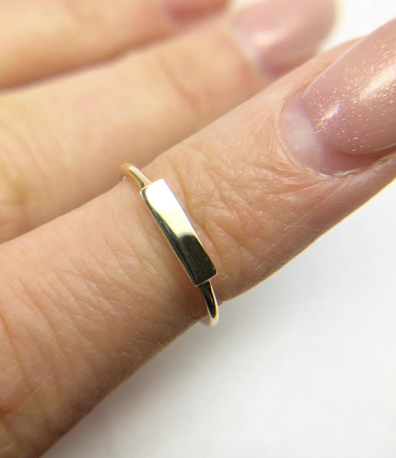Simple minimalist yellow gold ring made  in 18KT. Size 6 can be re-sized. It looks modern on finger and very stylish!

Certificate of authenticity comes with purchase!

ABOUT US
We are a family-owned business. Our studio in located in the heart of
