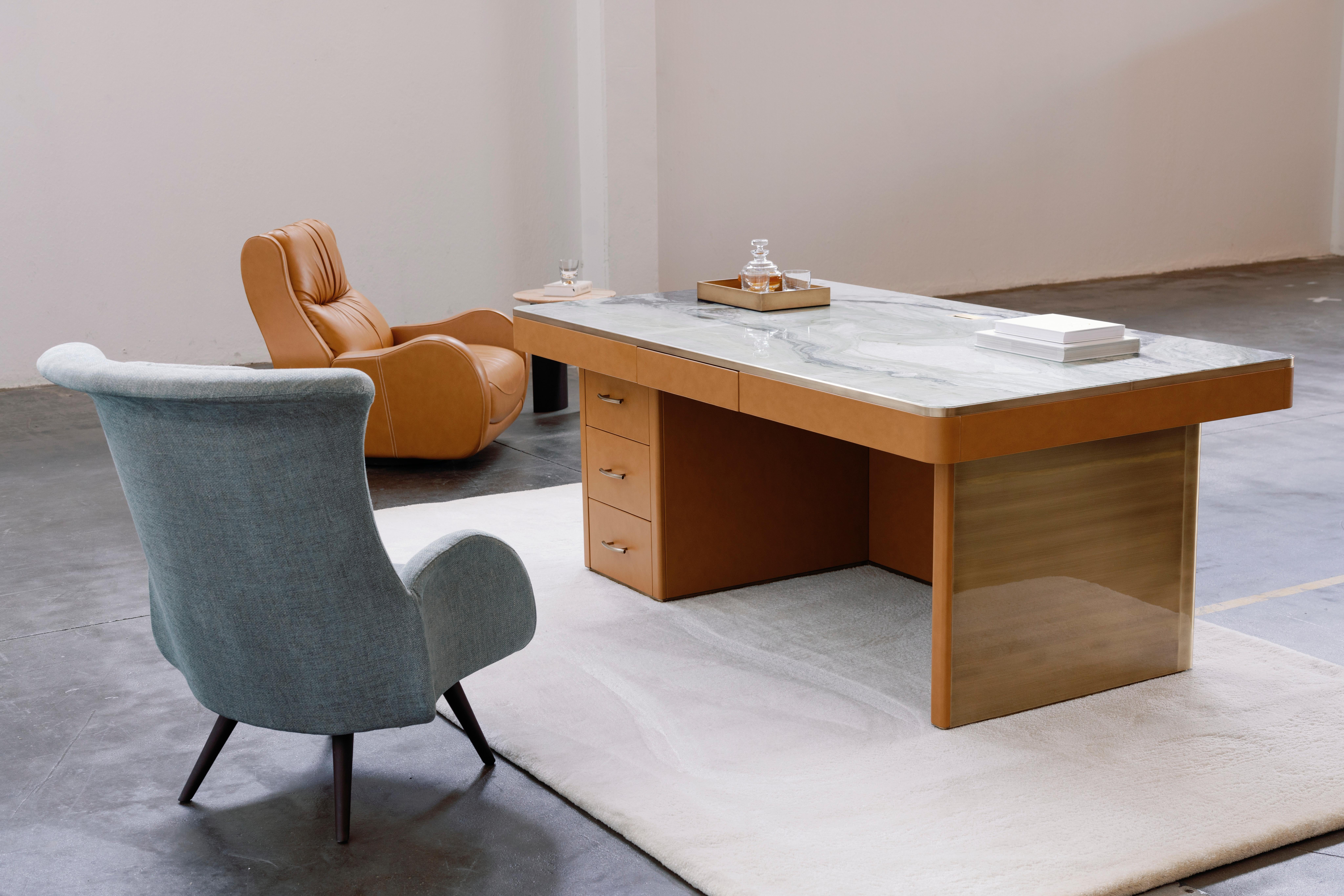 Barão Lounge Chair, Contemporary Collection, Handcrafted in Portugal - Europe by Greenapple.

The Barão lounge chair draws inspiration from the meticulous craftsmanship of shoemakers. Upholstered in chevron fabric with visible stitching, Barão