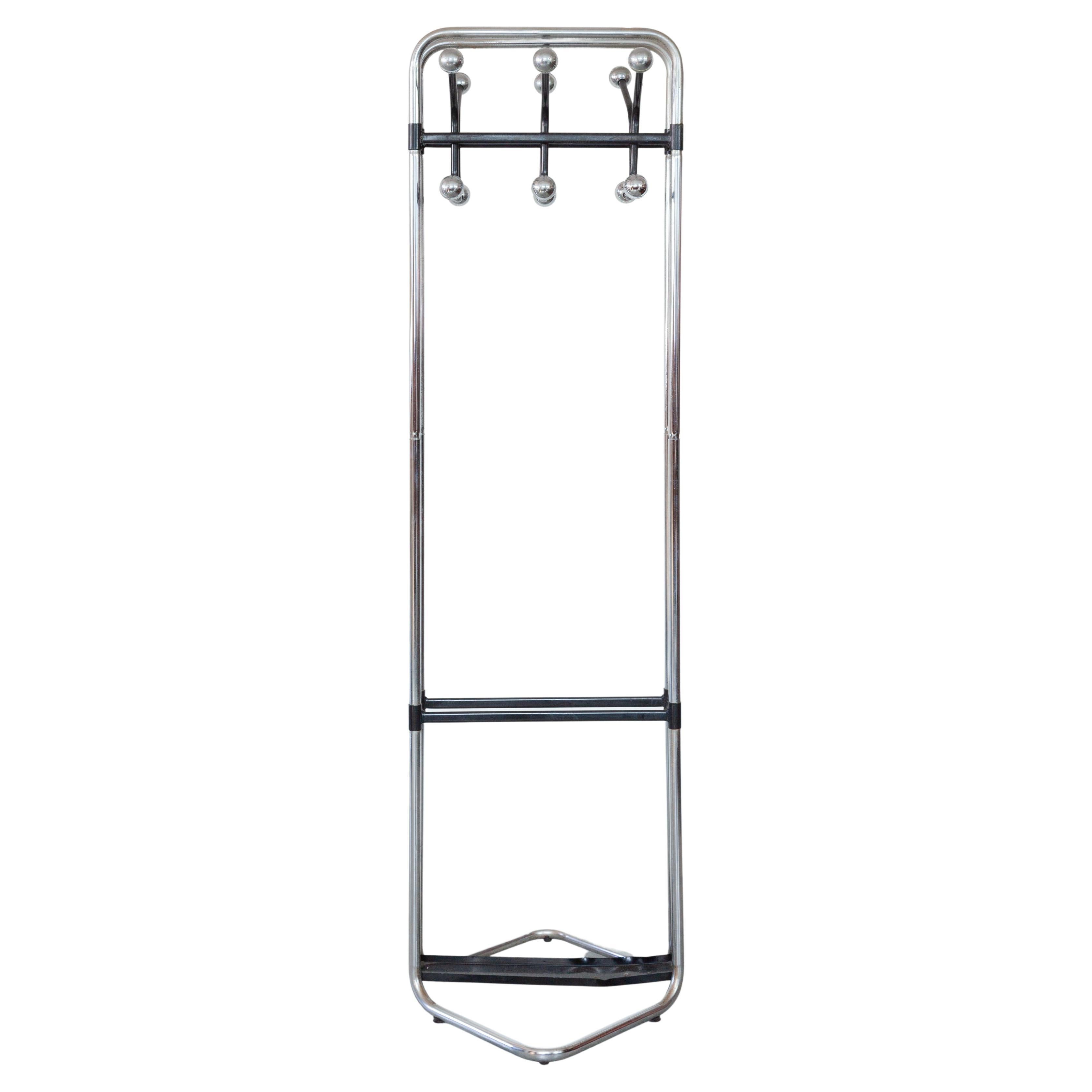 Beautiful bauhaus style free standing coat rack with the functionality to welcome your guests with a great place for storing coats in a hall. The Bauhaus style offers a sleek chrome finish over a tube frame with six chrome hooks finished with a