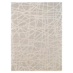Tapis moderne à motif linéaire abstrait beige et ivoire 9'x12'