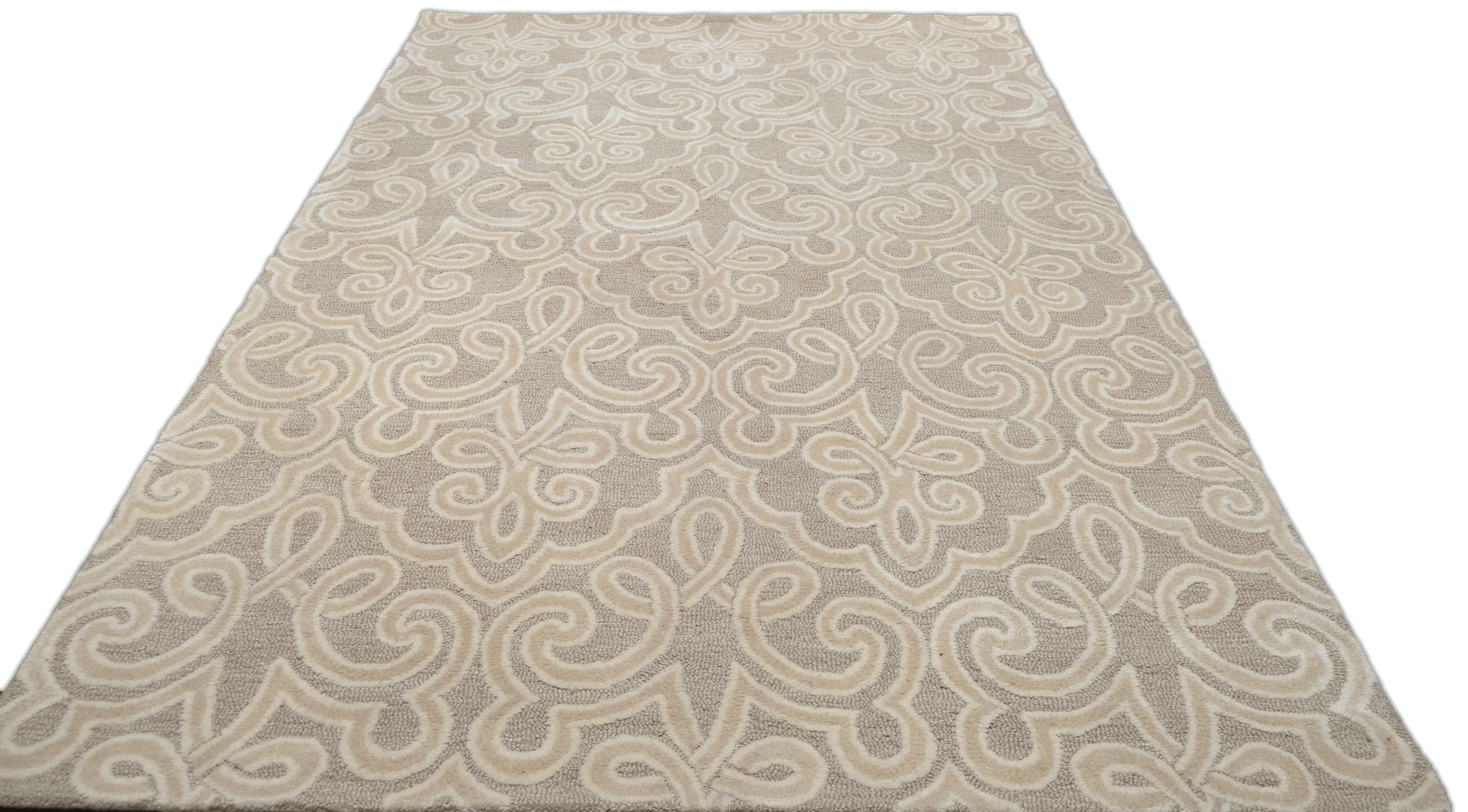 Moderner Wollteppich mit erhabenem Motiv in Beige und Taupe 6'x9' im Angebot 1