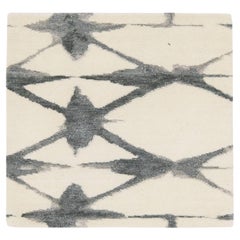 Alfombra moderna de lana beige hecha a mano por encargo