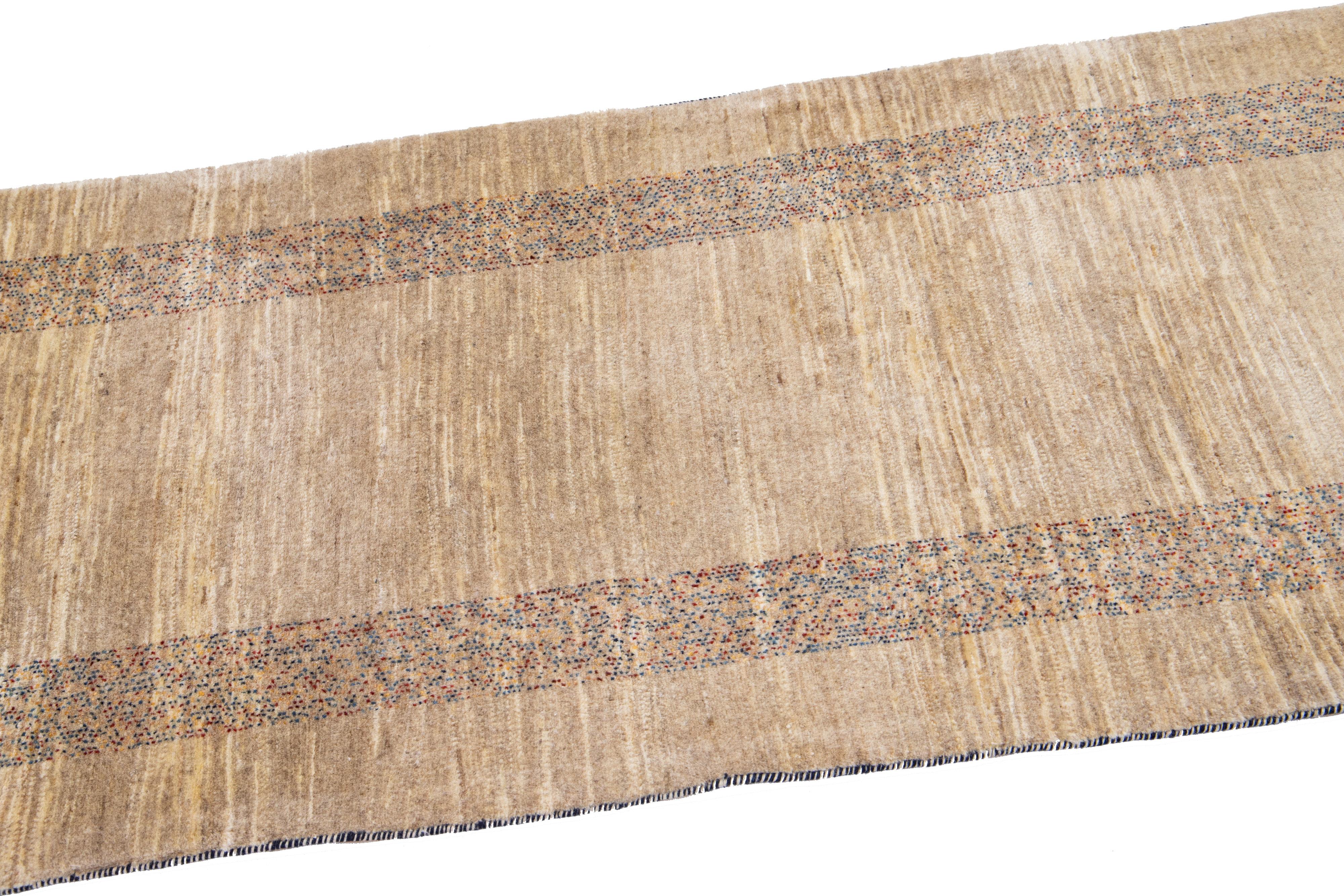 Hand-Woven Modern Beige Handmade Gabbeh Persian Wool Runner With Geometric Design For Sale