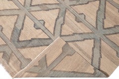 Tappeto moderno in lana a trama piatta Rug & Kilim beige con motivo geometrico