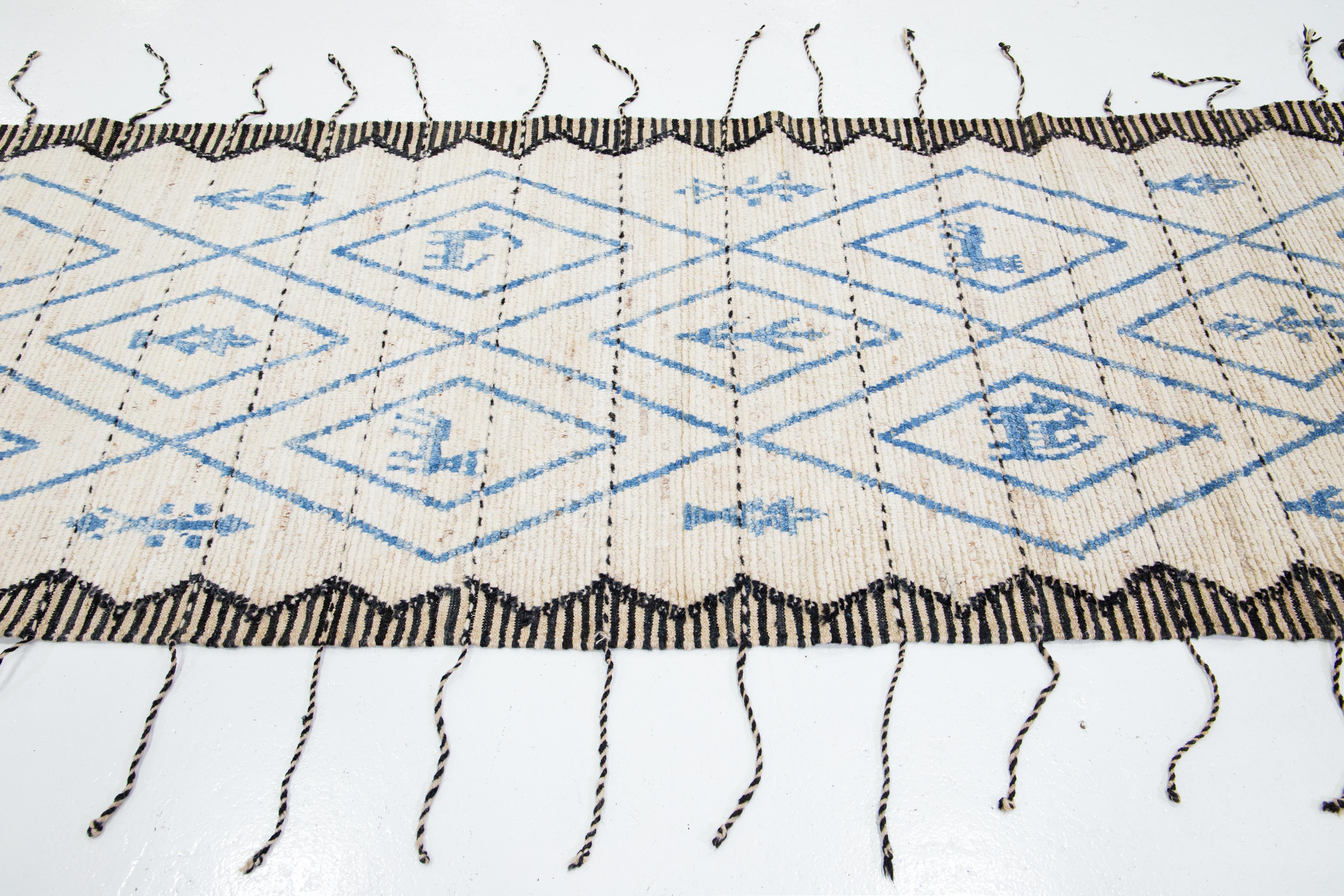 Hand-Knotted Modern Beige Moroccan Style Wool Runner With Blue Tribal Motif For Sale