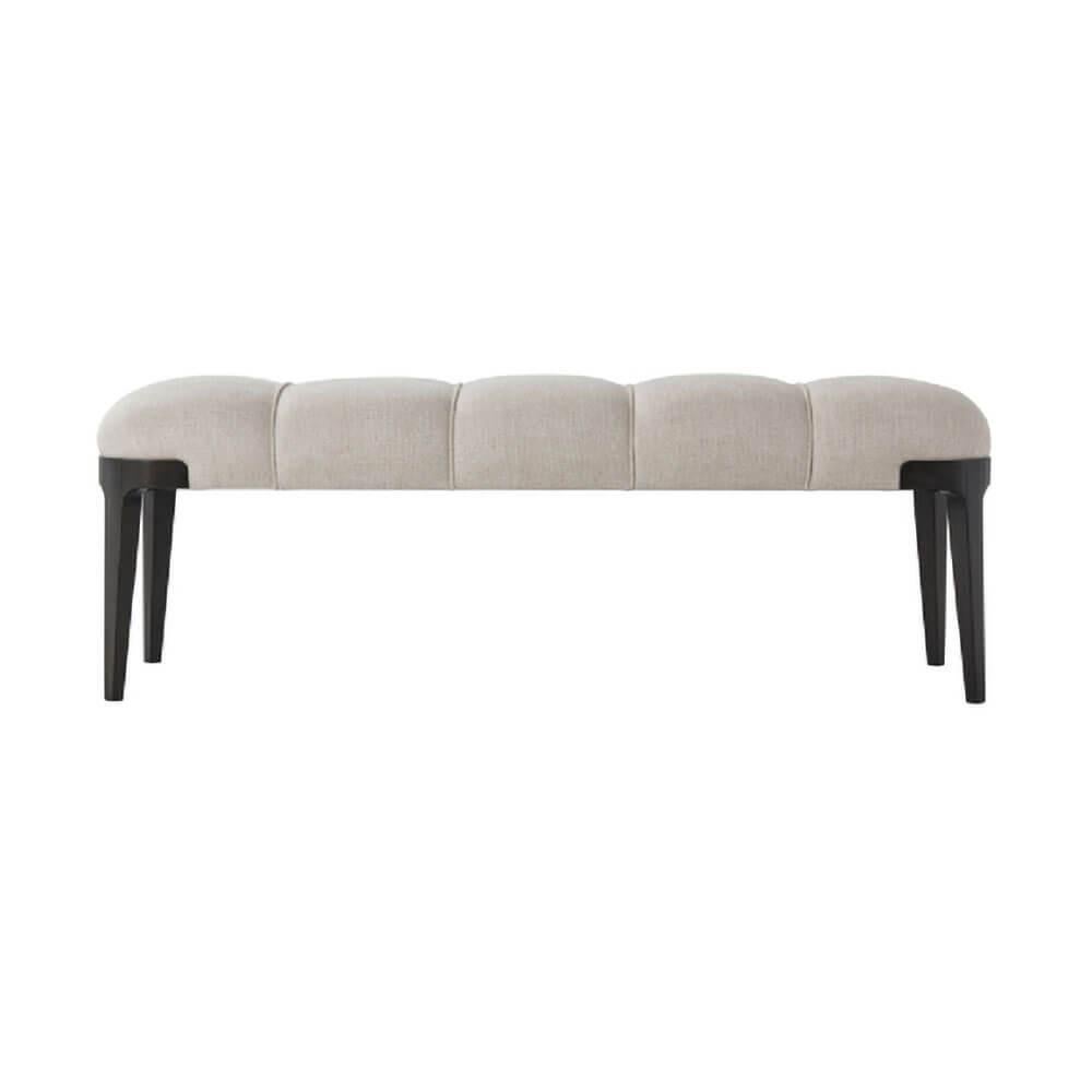 Modern bench with upholstered welted segmented seat cushion with a dark Macadamia stained beechwood frame on square tapered and out flaring legs. 

Dimensions: 55