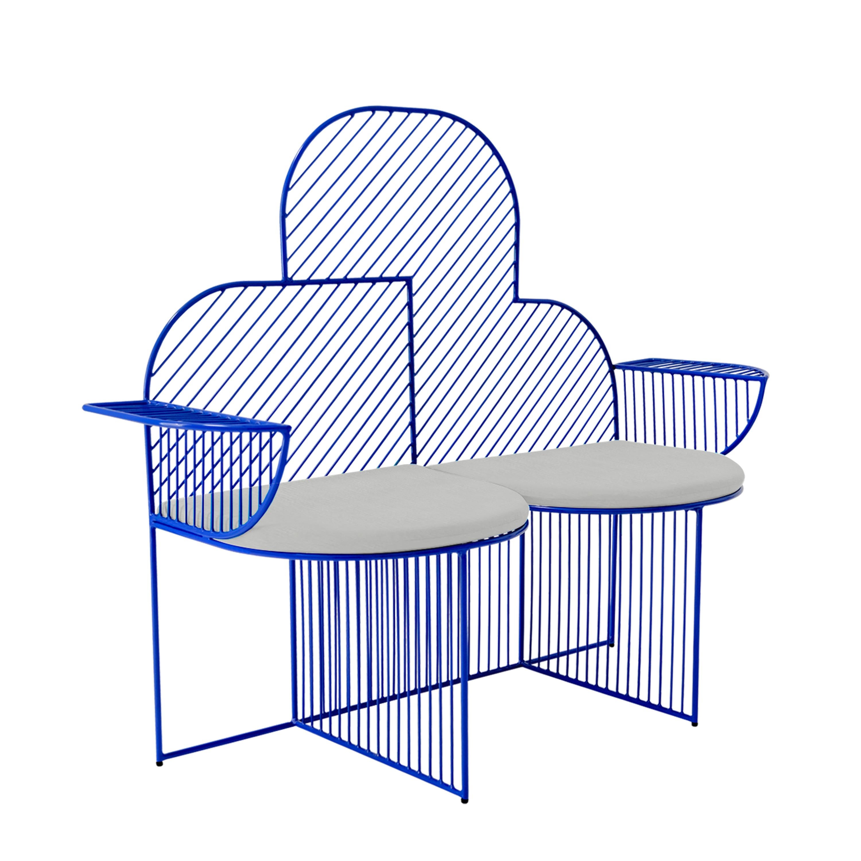 Made to inspire a smile and a photo-op, The Cloud bench is a bold, fun, and friendly wire lounge chair that sits two. With sunbrella padding and a cloud shape, this seat is perfect as outdoor garden furniture or a lounge chair for a porch or patio.