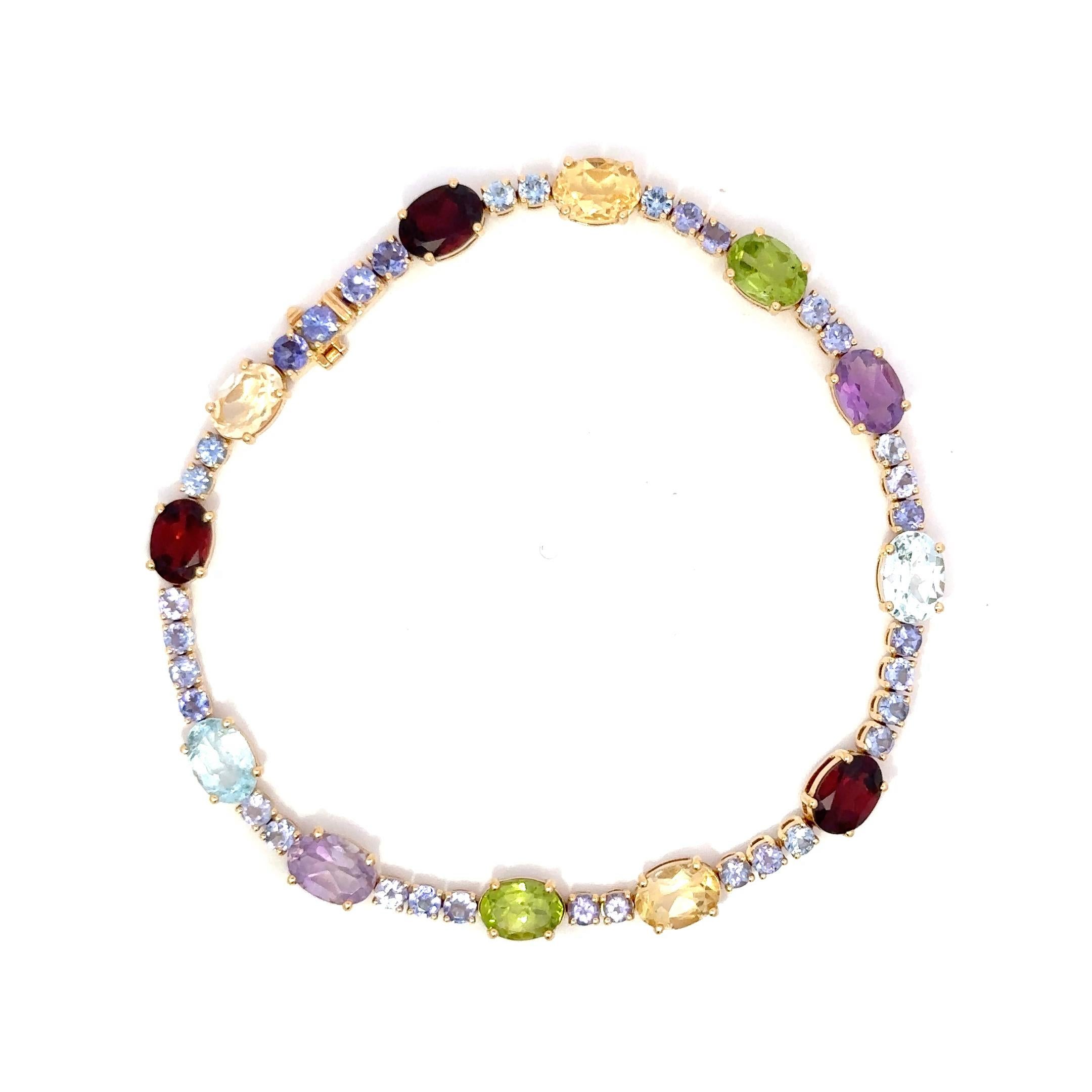 
Bracelet Tourmaline Garnet Beryl Amethyst Topaz 18K Yellow Gold For Her
Matching Earrings Avaliable 

With a heritage of ancient fine Swiss jewelry traditions, NATKINA is a Geneva based jewellery brand, which creates modern jewellery masterpieces