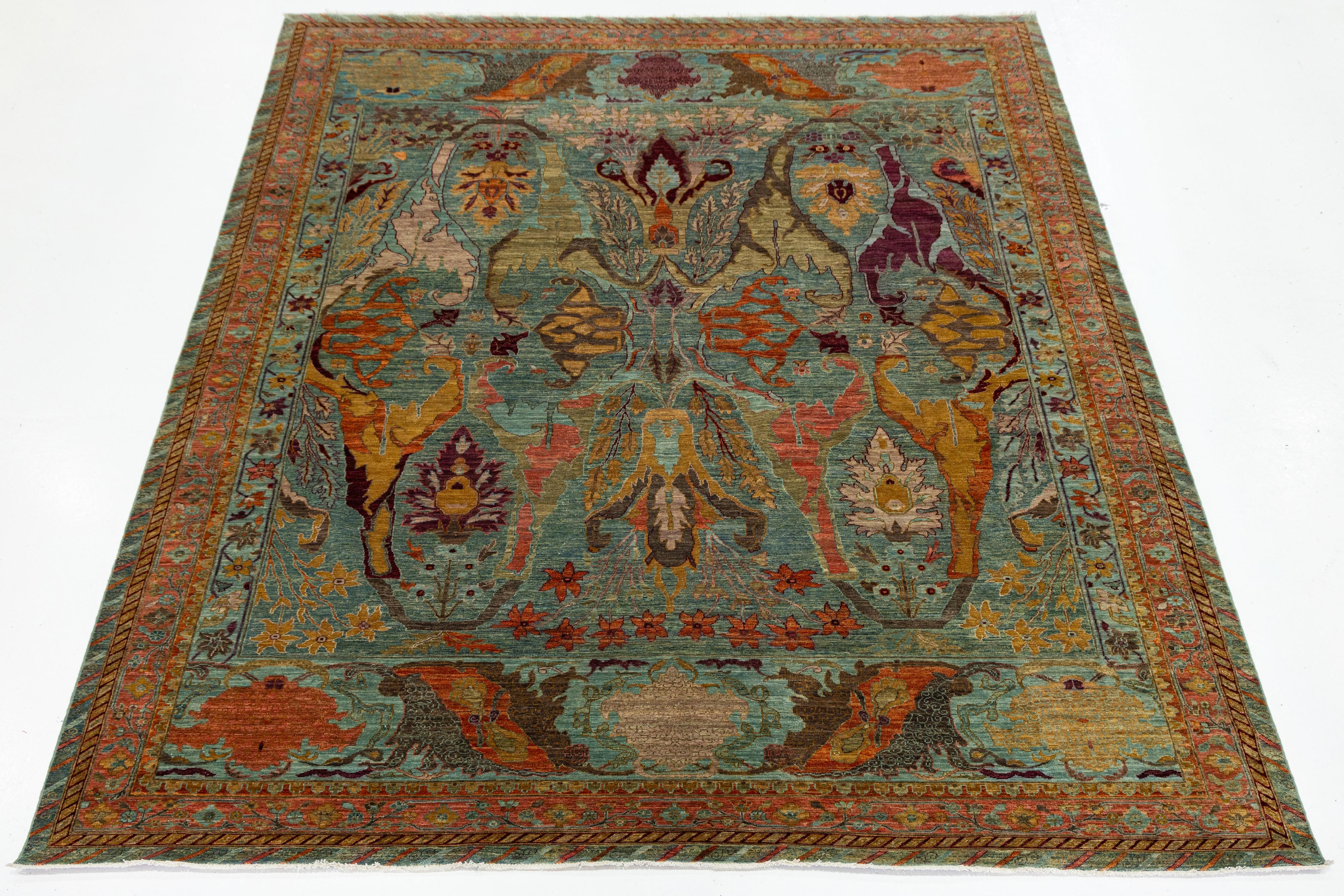 Ce tapis contemporain de style Bidjar présente un tissage de laine dense et un médaillon central saisissant avec des motifs floraux en miroir dans des tons riches de sarcelle, d'or, de rouge et d'indigo. Une réinterprétation audacieuse de la