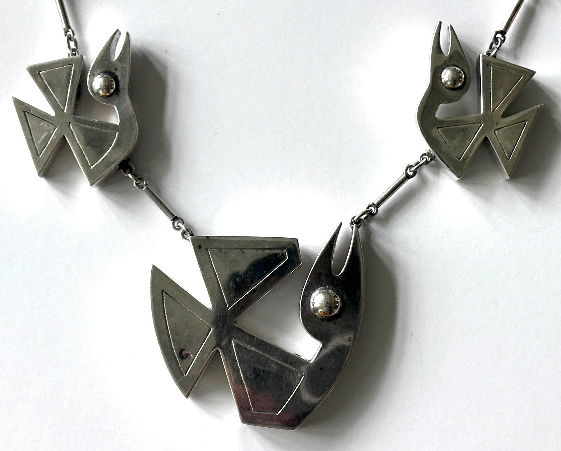 Hand-Crafted Modern Bird Motif Sterling Silver Necklace and Earrings Set Graziella Laffi For Sale