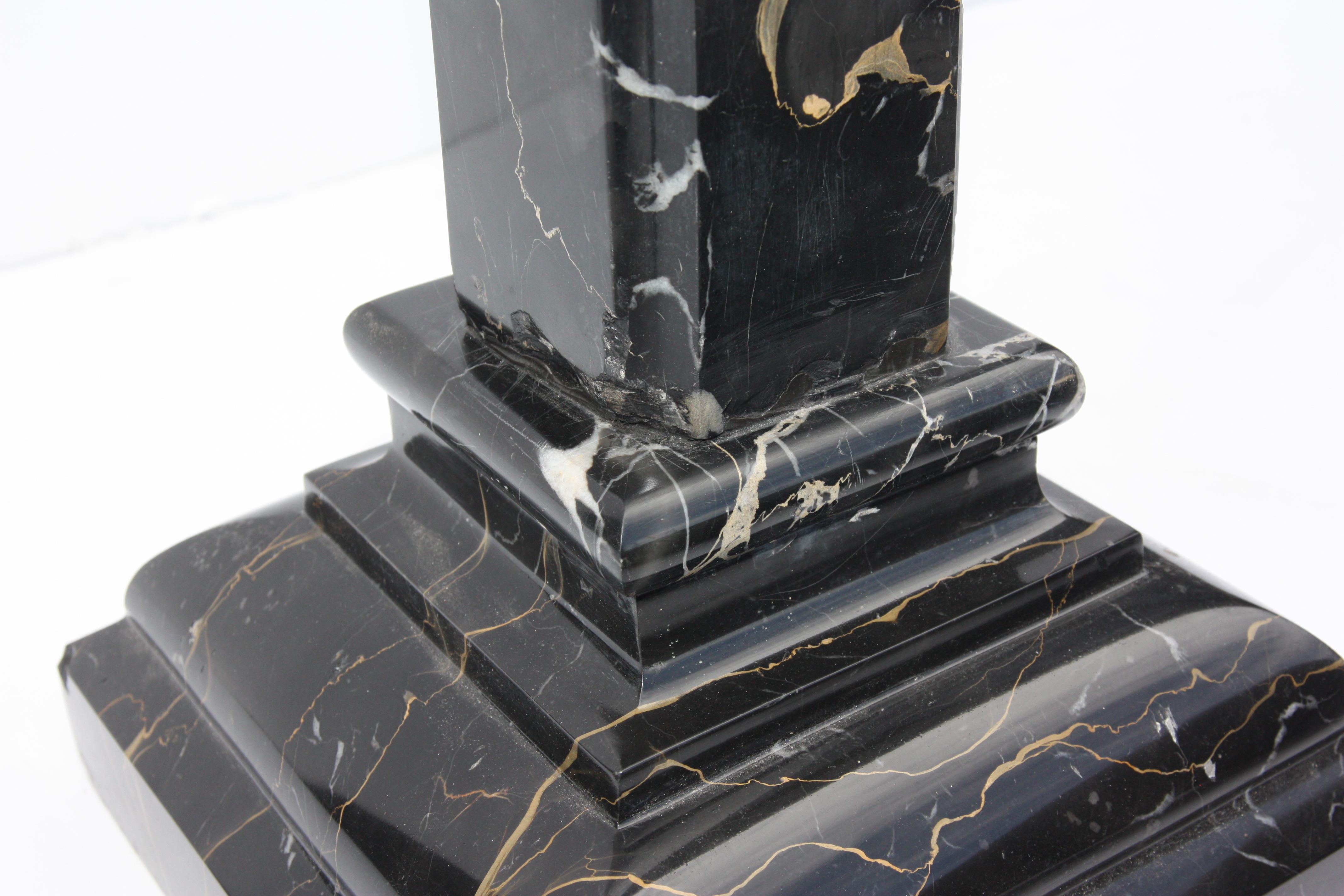 black marble pedestal