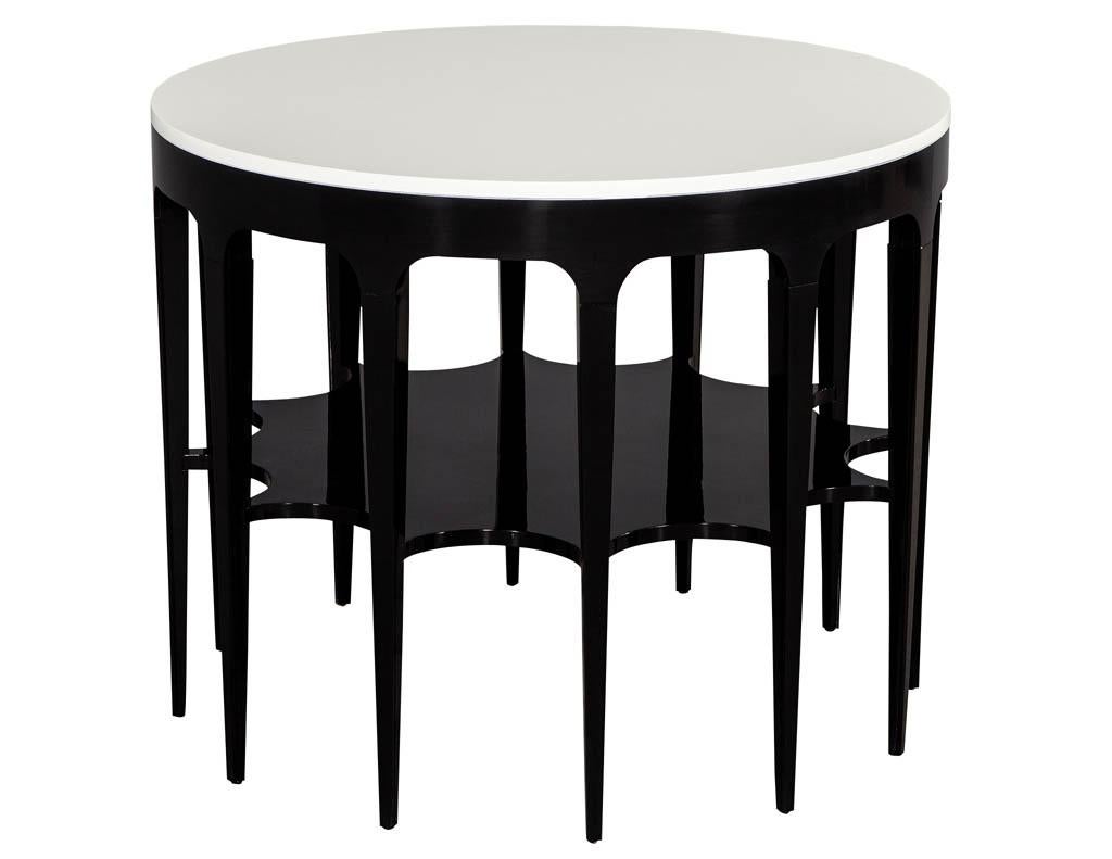 Modern black and white custom center table. Featuring custom hand polished lacquer finish and unique sunburst carving design.

Price includes complimentary scheduled curb side delivery service to the continental USA.