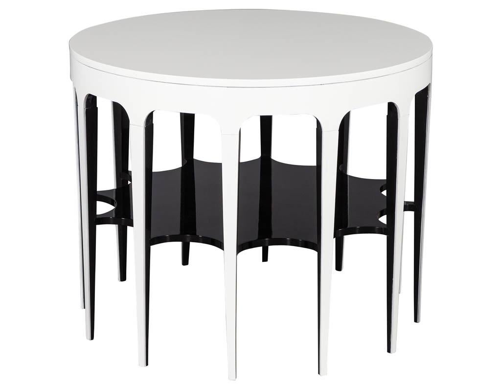 Modern black and white custom center table. Featuring custom hand polished lacquer finish and unique sunburst carving design.

Price includes complimentary scheduled curb side delivery service to the continental USA.