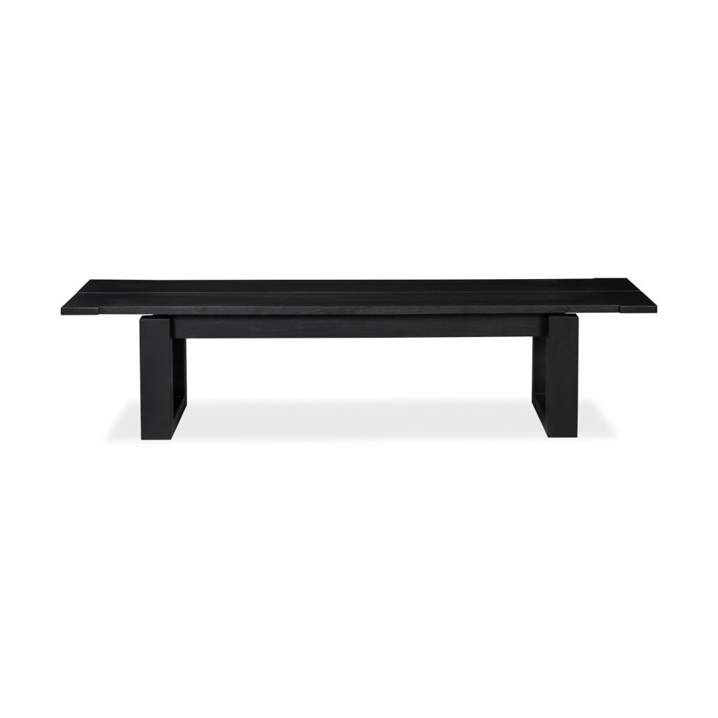 Marrying sleek minimalism with a bold black finish and made with reclaimed wood. It serves as a statement while blending with various decors of understated sophistication, with a focus on furniture that offers tranquility and comfort. The simple