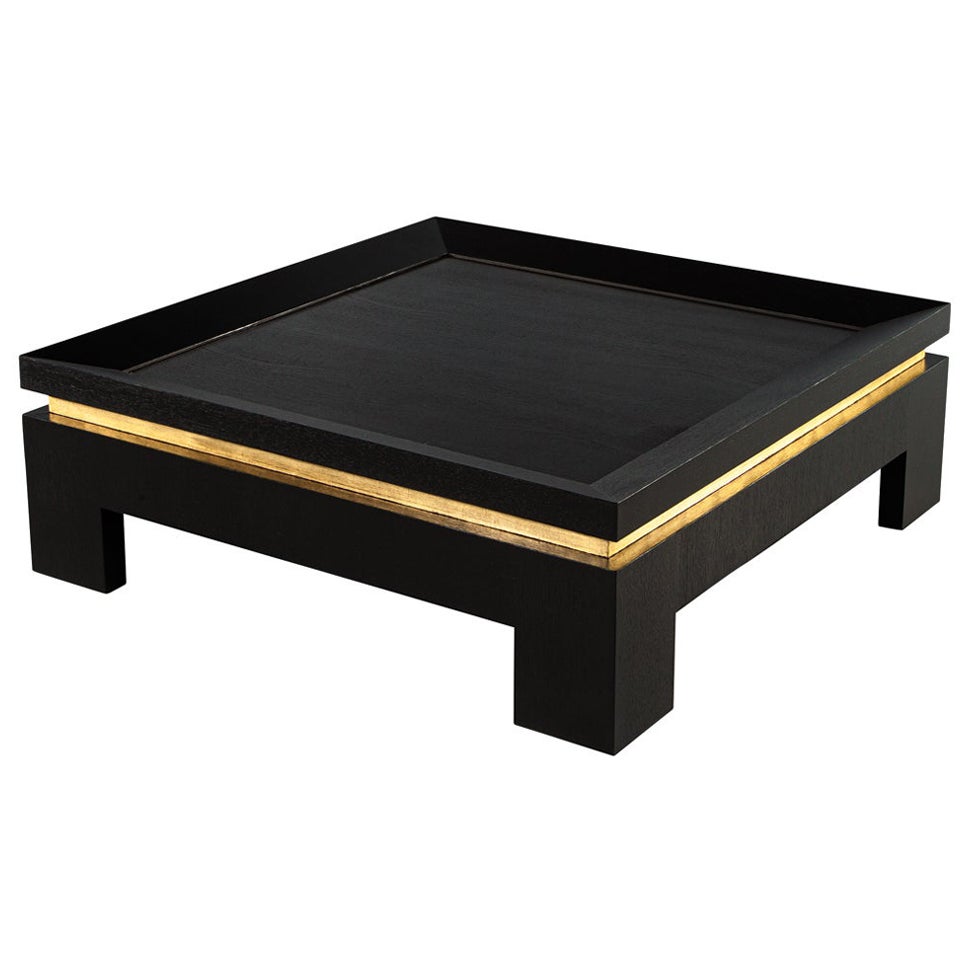 Tavolino moderno nero con accenti in foglia d'oro