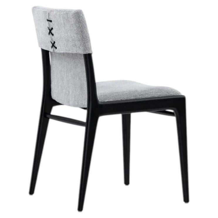 Modern Black Dining Chair with Black & White Upholstery and Lace-Up Back Detail