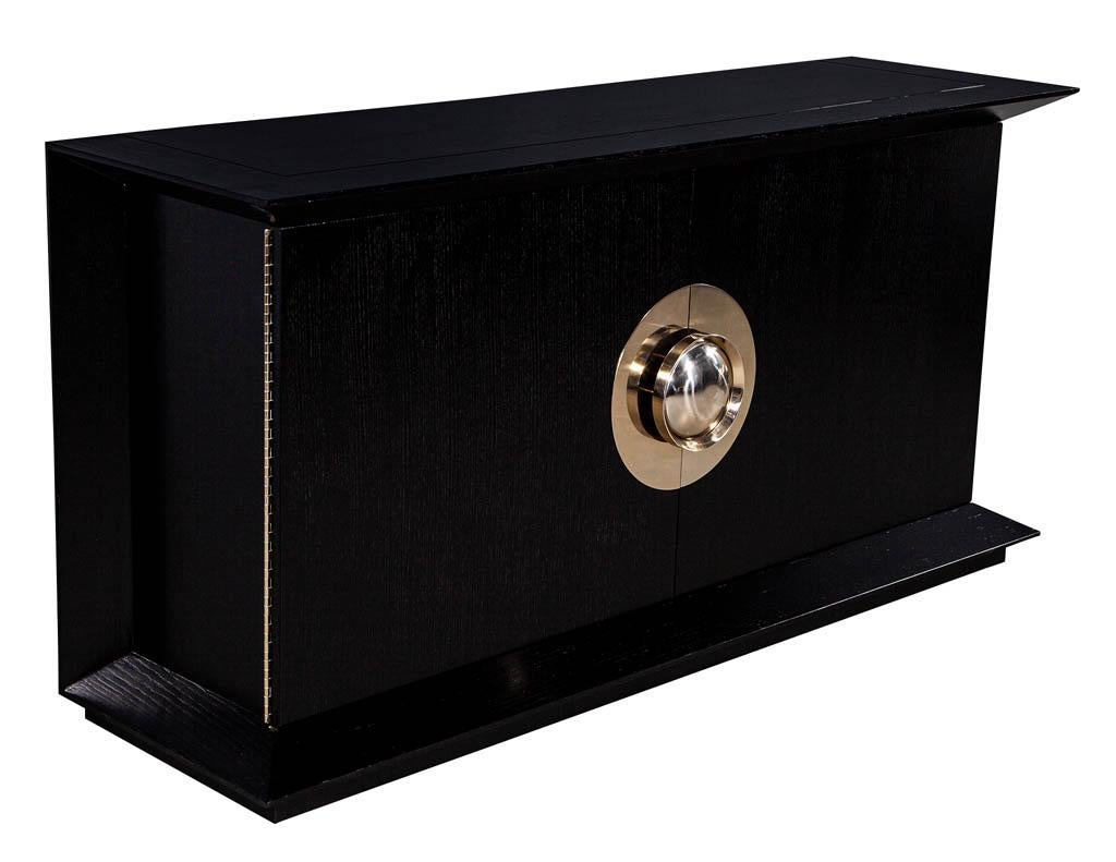 Modern black flared sideboard buffet. Stunning sideboard with an outstanding polished nickel circular hardware. Made of select rift cut oak finished in a satin black lacquer.

Price includes complimentary scheduled curb side delivery service to