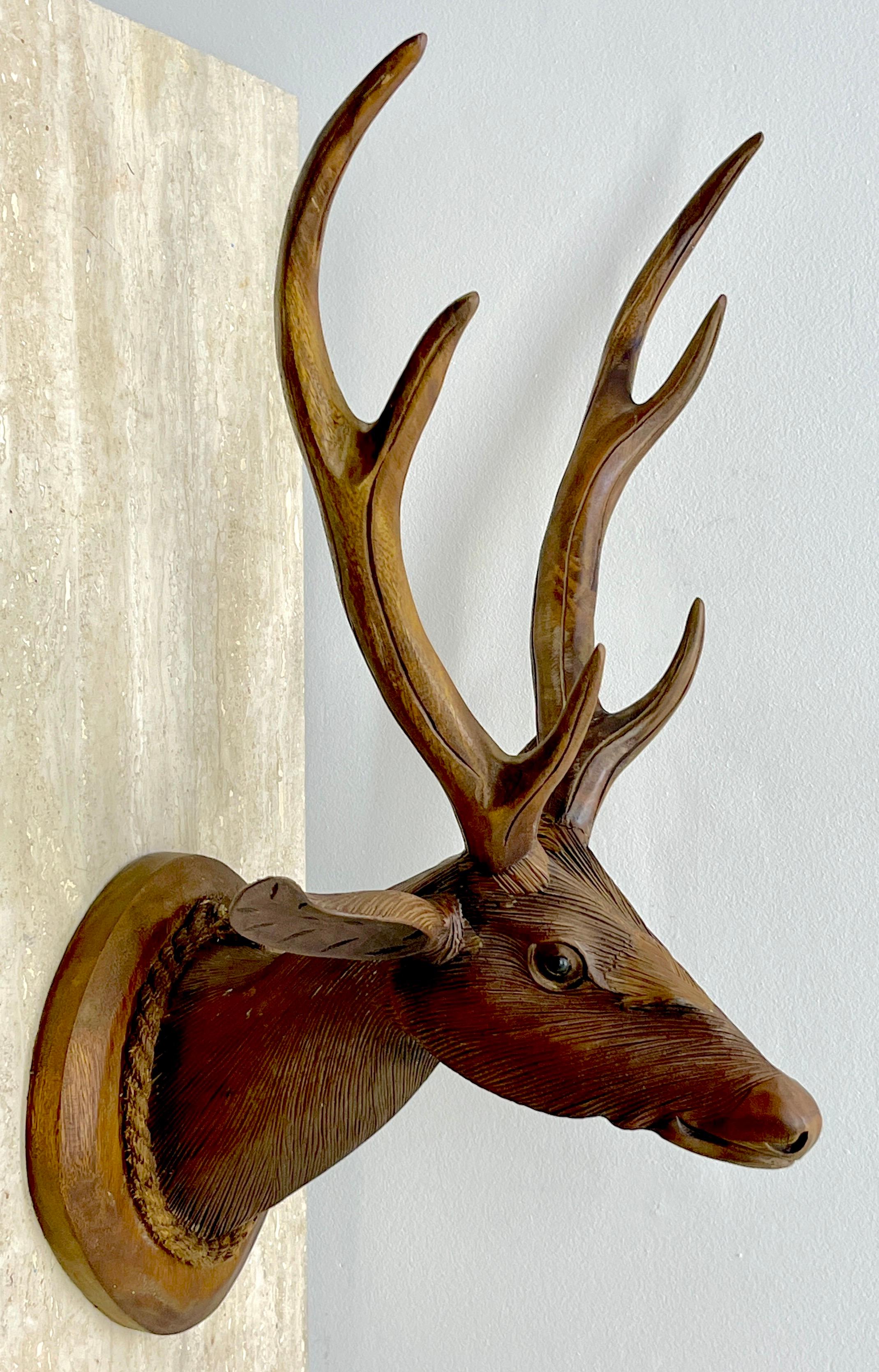 Modern Black Forrest Carved Walnut 6 -Point Deer Shoulder Mount
Switzerland, Circa 1960s

Enhance your space with the timeless elegance of this Modern Black Forest Carved Walnut 6-Point Deer Shoulder Mount. Originating from Switzerland and dating