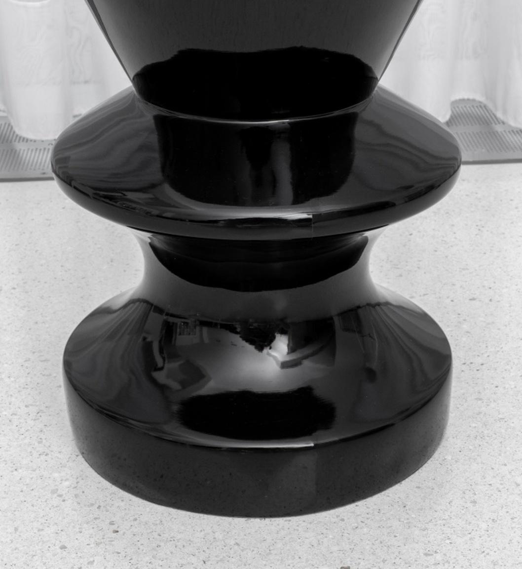Modern black lacquered composite circular end table or stool. 17.5
