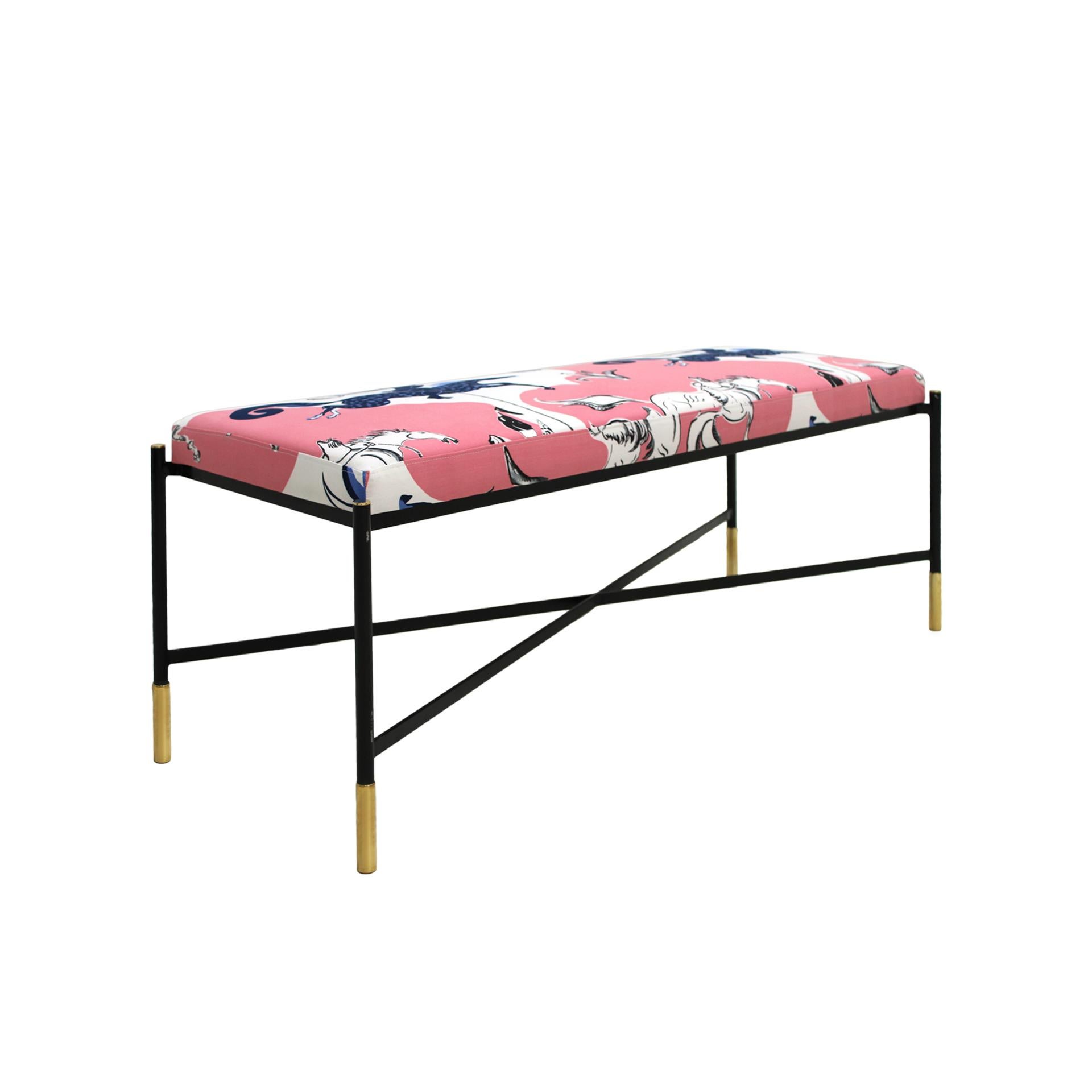 Footstool with black lacquered iron structure and legs ending in brass sleeves. It has been newly reupholstered in this stunning pink and blue horses galloping for a movement of composition cotton fabric, model 