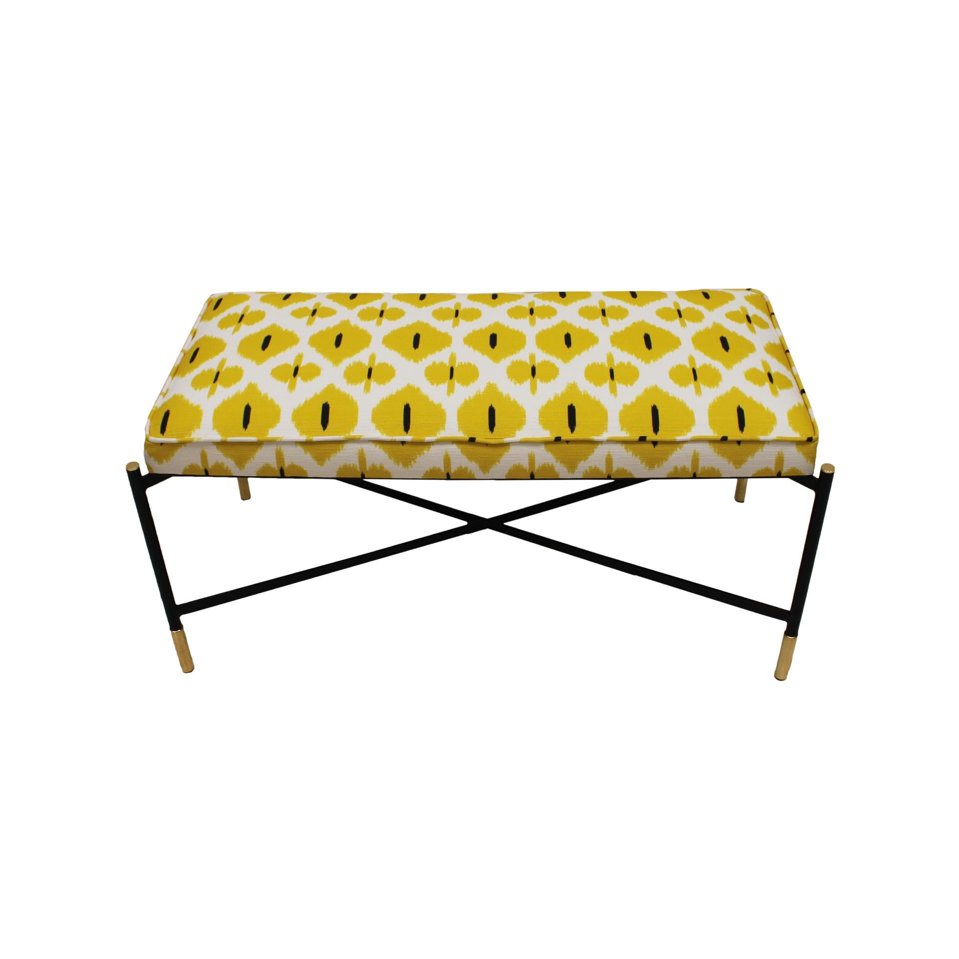 Footstool with black lacquered iron structure and legs ending in brass sleeves. It has been newly reupholstered in this stunning yellow print of cotton and linen fabric. Italy, 1970s.

Every item LA Studio offers is checked by our team of 10