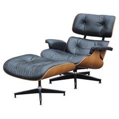 Chaise longue et pouf moderne Eames Herman Miller en cuir noir et bois de rose