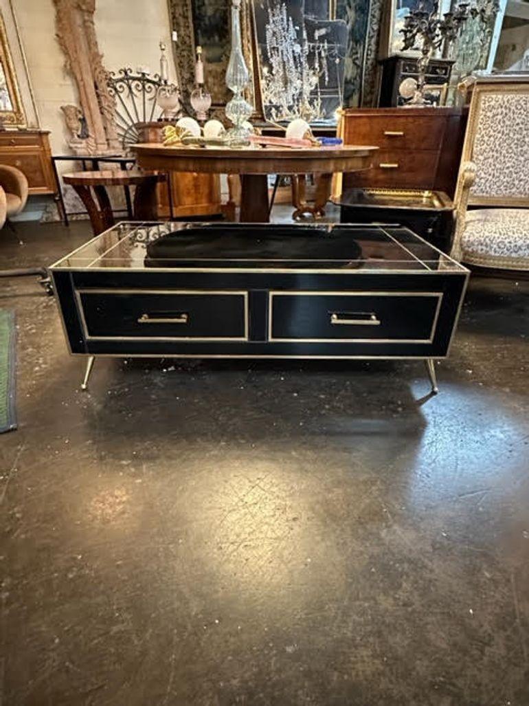 Fabulous modern black Murano glass and brass coffee table. Creates a very stylish look!