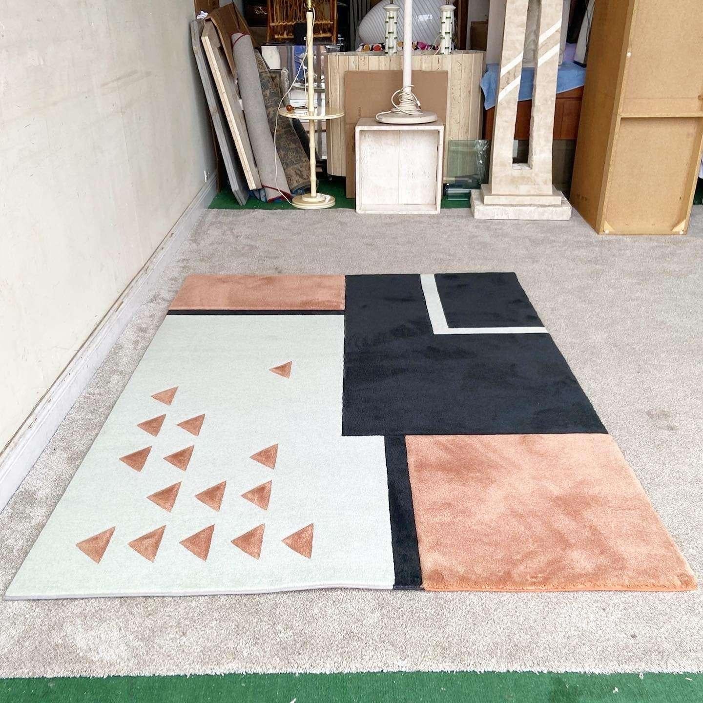 black and rose gold rug