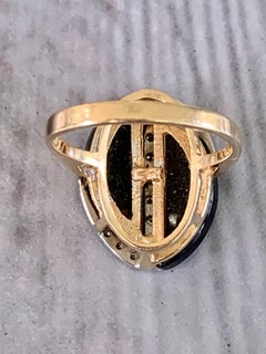 Modern Black Onyx and Diamond 14 Karat Yellow Gold Fashion Ring