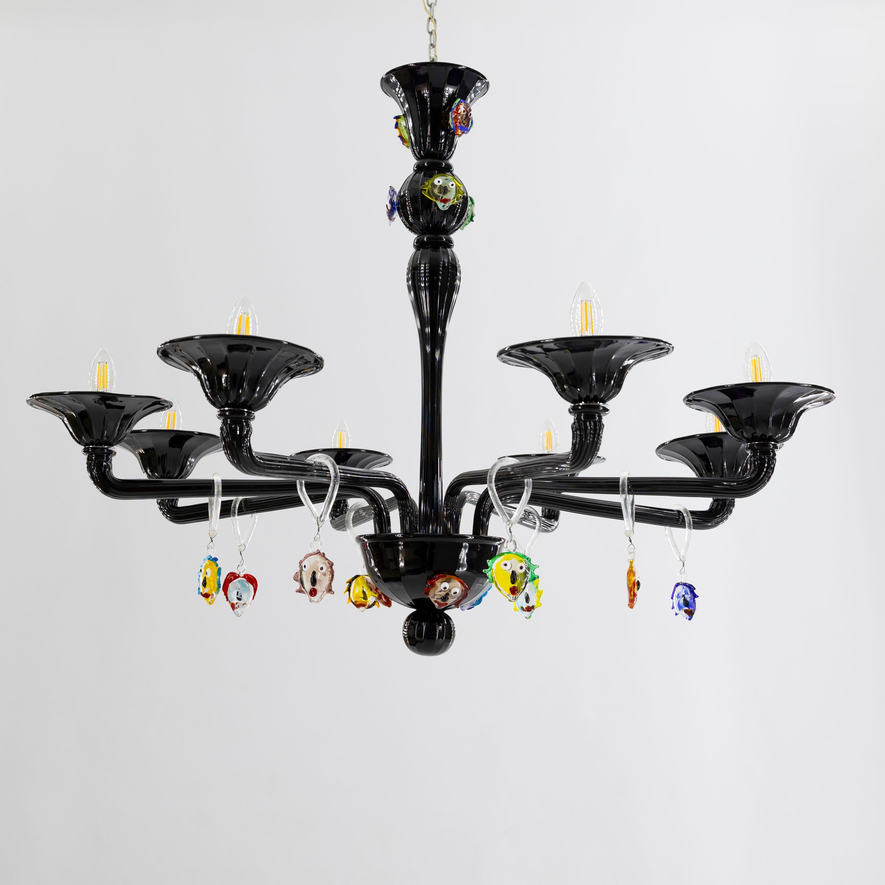 This is a remarkable chandelier, entirely handcrafted from blown Murano glass.  Each component is rendered in solid black, and the design is embellished with 