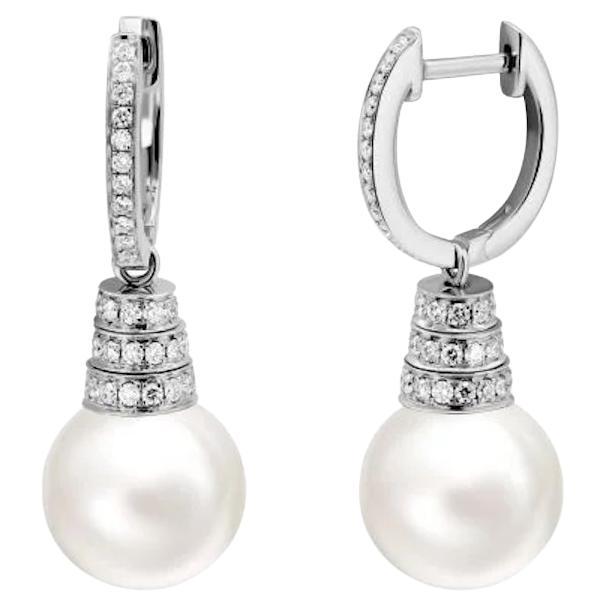 Earrings
Same Model White Pearl Available 

White Gold 18K

Weight 7,29 grams

Diam. 94-0,59 ct

PEARL  d10,5-11,0 2-17,8 ct

With a heritage of ancient fine Swiss jewelry traditions, NATKINA is a Geneva based jewellery brand, which creates modern