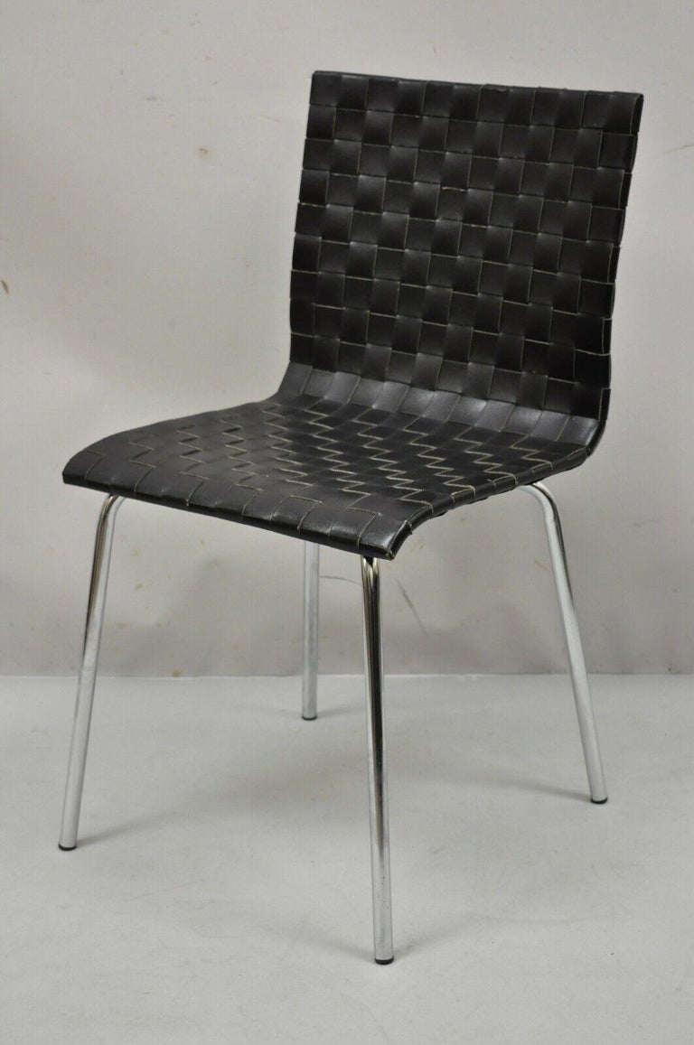 Modern Black Woven Leather Chrome Frame Dining Chairs - Set of 4. Item features black woven leather seats, chrome frames, very nice set, clean modernist lines, quality craftsmanship, great style and form. Circa Mid to Late 20th Century.