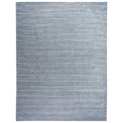 Tapis moderne à rayures bleues et grises