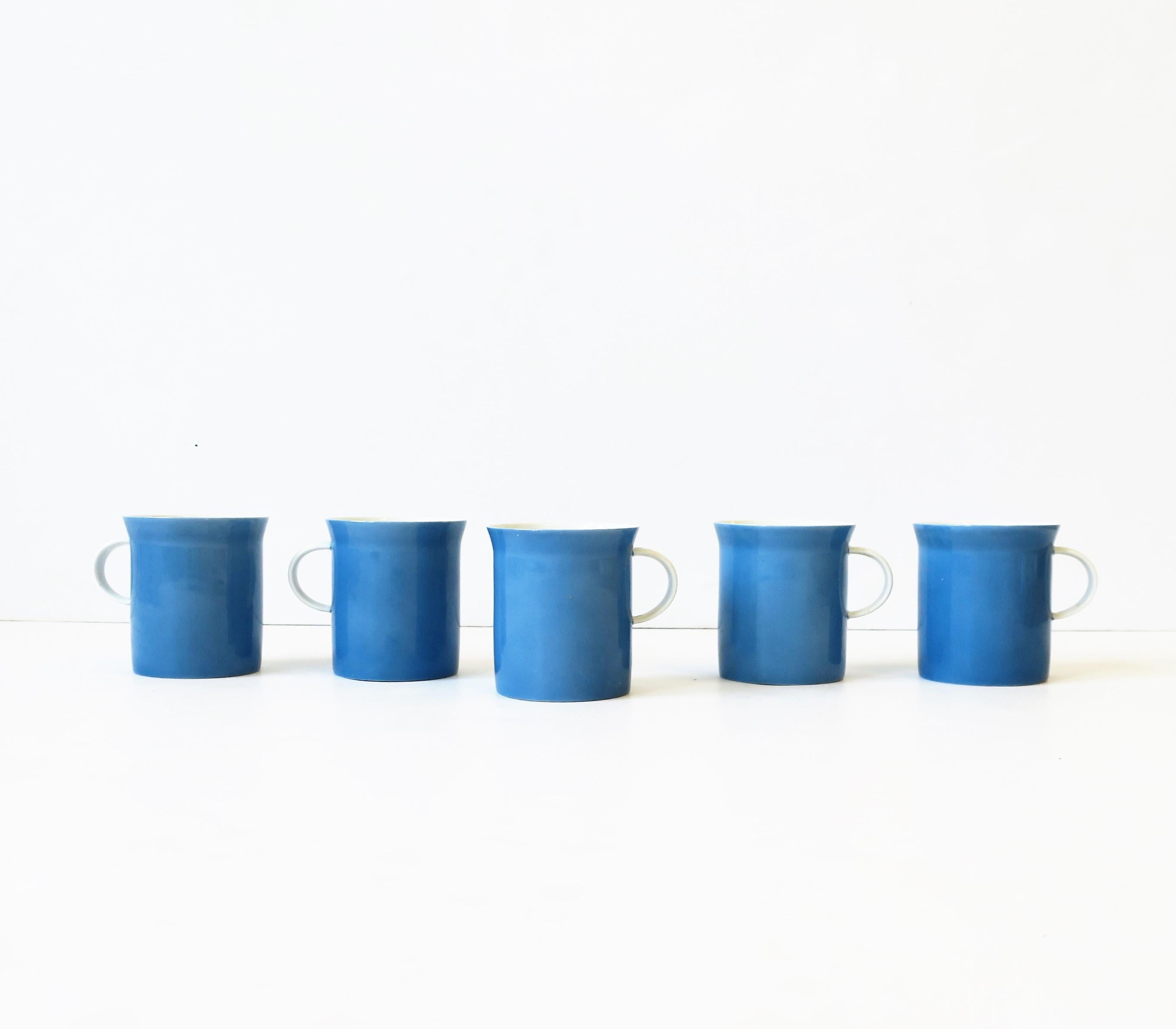 A very beautiful and rare set of five (5) Mid-Century Modern blue and white porcelain coffee or tea cups by Rosenthal, circa Mid-20th century, Germany. With maker's mark on bottom as show in images #12 and 13. 

Each cup measures: 2.5