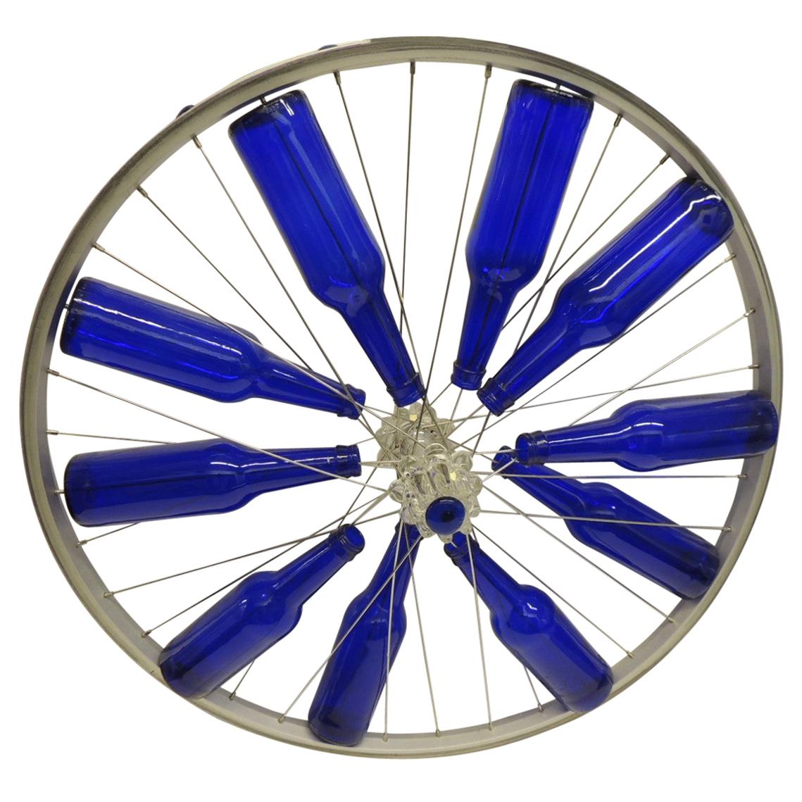Modern Blue Bottles on a Bike Wheel Sculpture